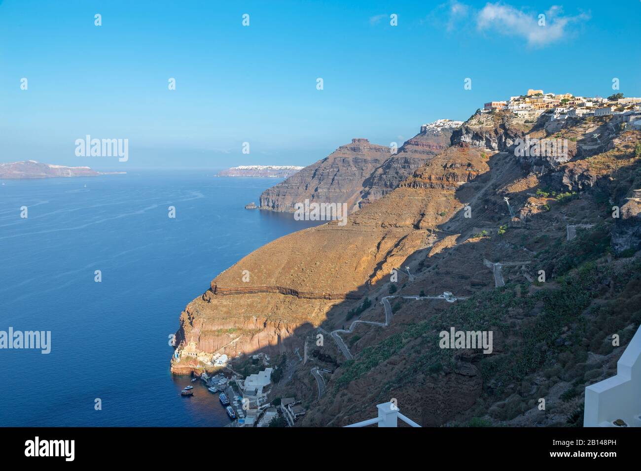 Santorini - The panorama of Fira and Firostefani at morning Stock Photo