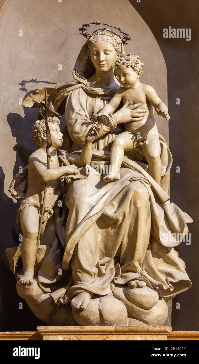 Giovanni madonna and child with st john the baptist hi-res stock ...
