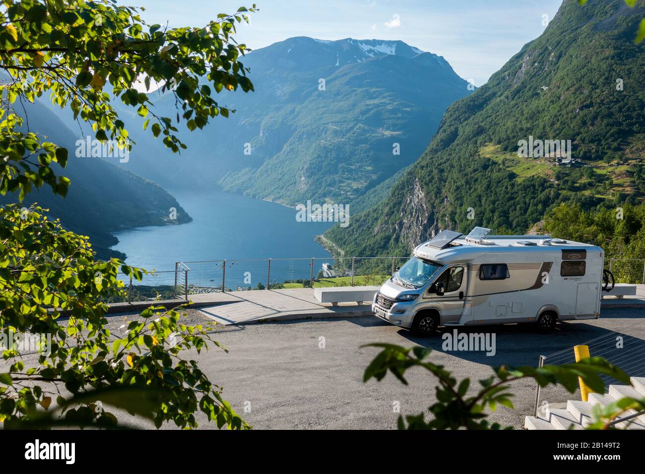 Mobile home, parking lot, Geiranger fjord Norway Stock Photo