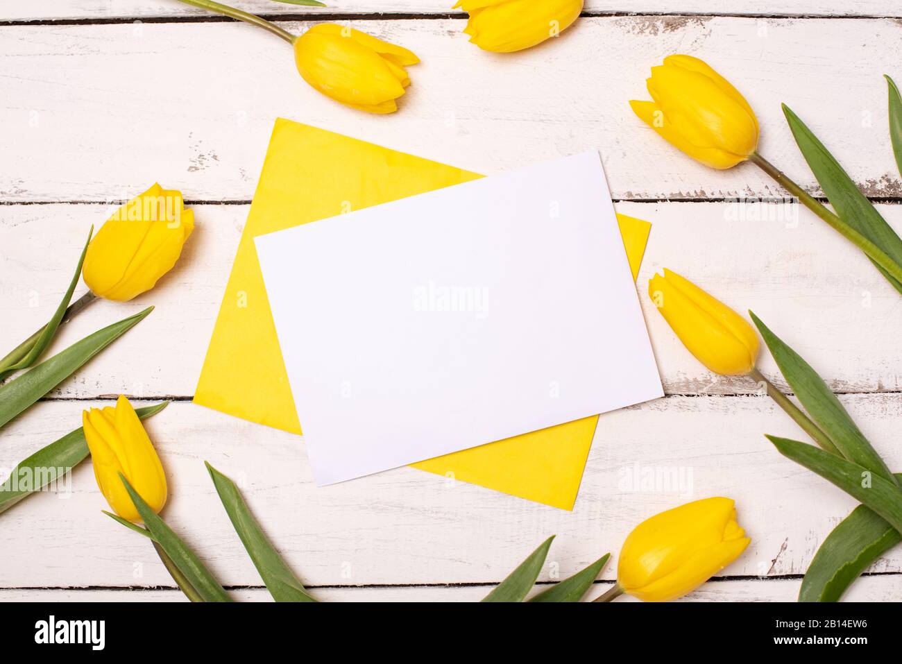 Happy Easter. Congratulatory easter background. Easter eggs and flowers Stock Photo