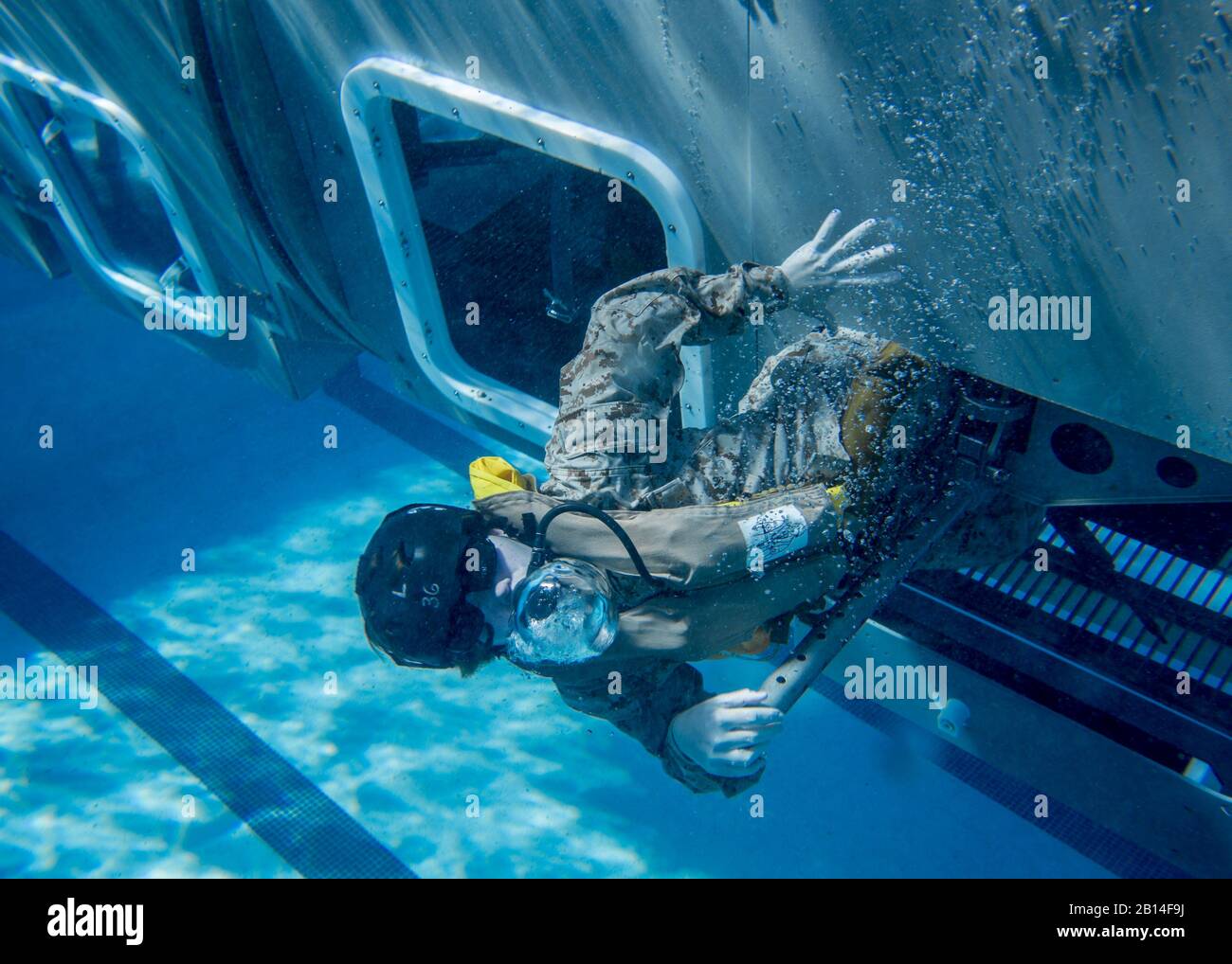 U.S. Marines with the 13th Marine Expeditionary Unit, I Marine Expeditionary Force, conducted underwater egress survival training on Camp Pendleton, Calif., Feb 9, 2018. The Modular Amphibious Egress Trainer resembles a helicopter and is used to train Marines in escape procedures in the event of a crash in water.  (U.S. Marine Corps photo by Lance Cpl. Dylan Chagnon) Stock Photo