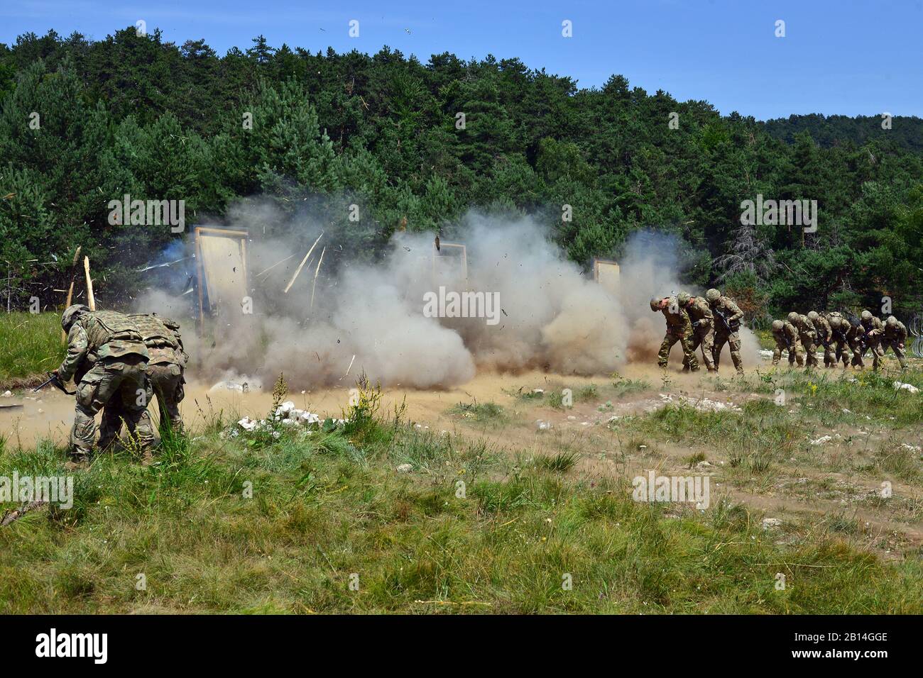 U.S. Army Paratroopers assigned to the 54th Brigade Engineer Battalion, 173rd Airborne Brigade, conduct urban breach training as part of Exercise Rock Knight at Pocek Range in Postonja, Slovenia, July 20, 2017. Exercise Rock Knight is a bilateral training exercise between the U.S. Army 173rd Airborne Brigade and the Slovenian Armed Forces, focused on small-unit tactics and building on previous lessons learned, forging the bonds and enhancing readiness between allied forces. The 173rd Airborne Brigade is the U.S. Army's Contingency Response Force in Europe, providing rapidly-deploying forces to Stock Photo