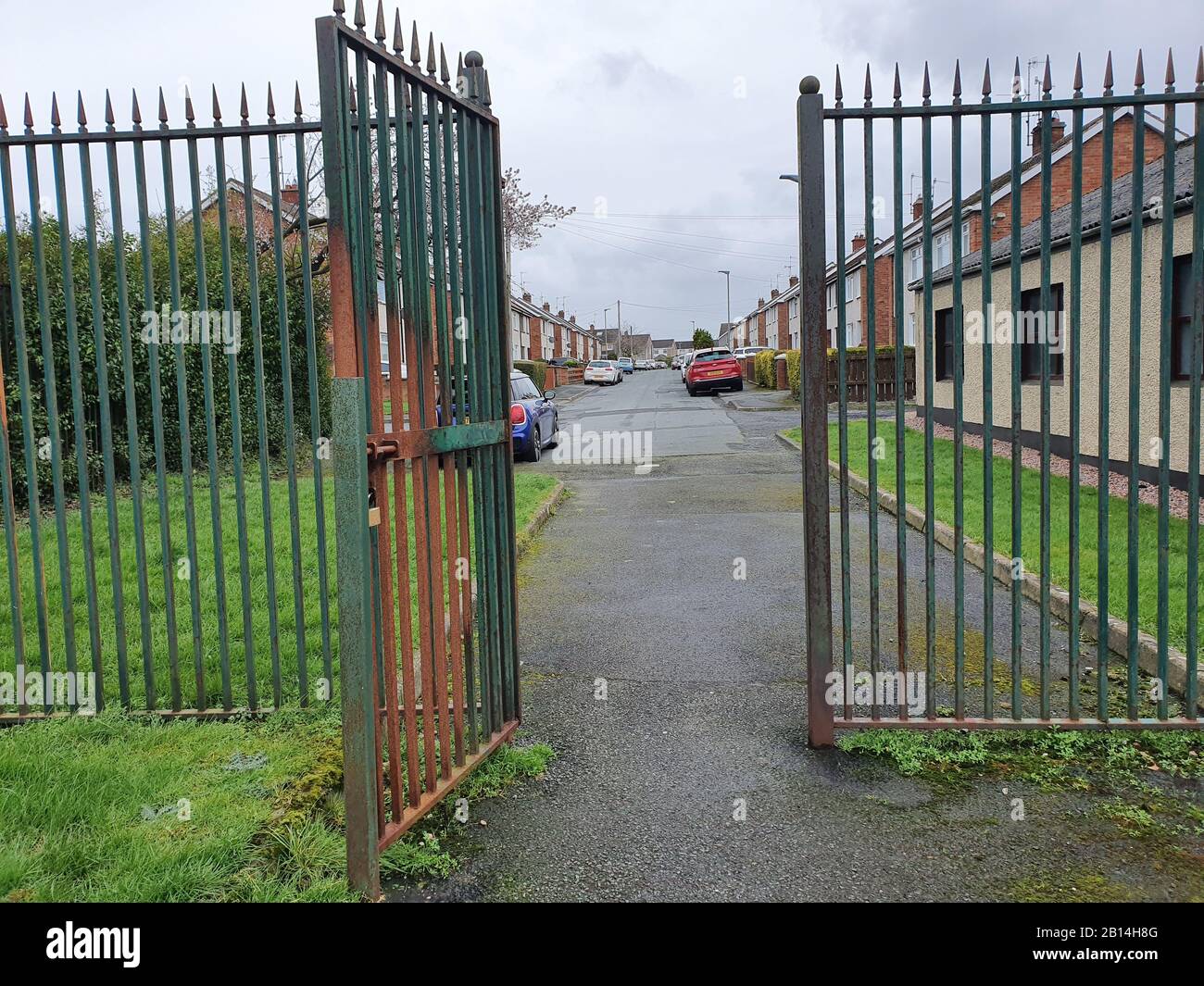 A post ceasefire steel interface fence at Margretta Park in Lurgan, County Armagh, as there are plans for it to be transformed with work due to start in the summer months. The structure dates back to 1999 and is one of dozens of remaining peace wall structures which remain to separate communities in Northern Ireland. Stock Photo