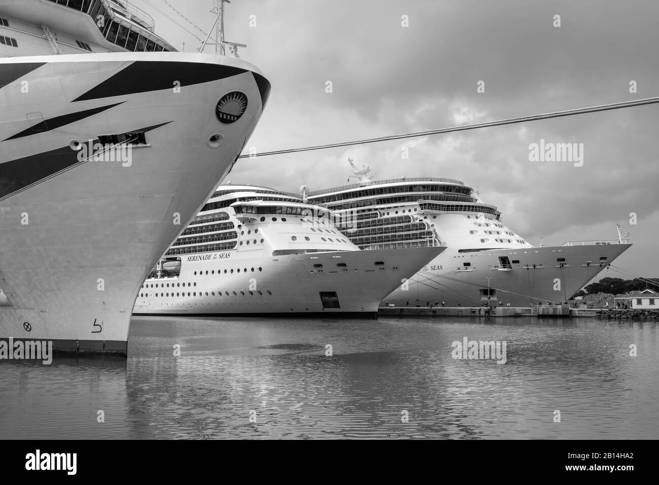 St John's, Antigua and Barbuda - December 18, 2018: Cruise ships moored at the port of Antigua on St John's in cloudy weather, Antigua and Barbuda. Bl Stock Photo