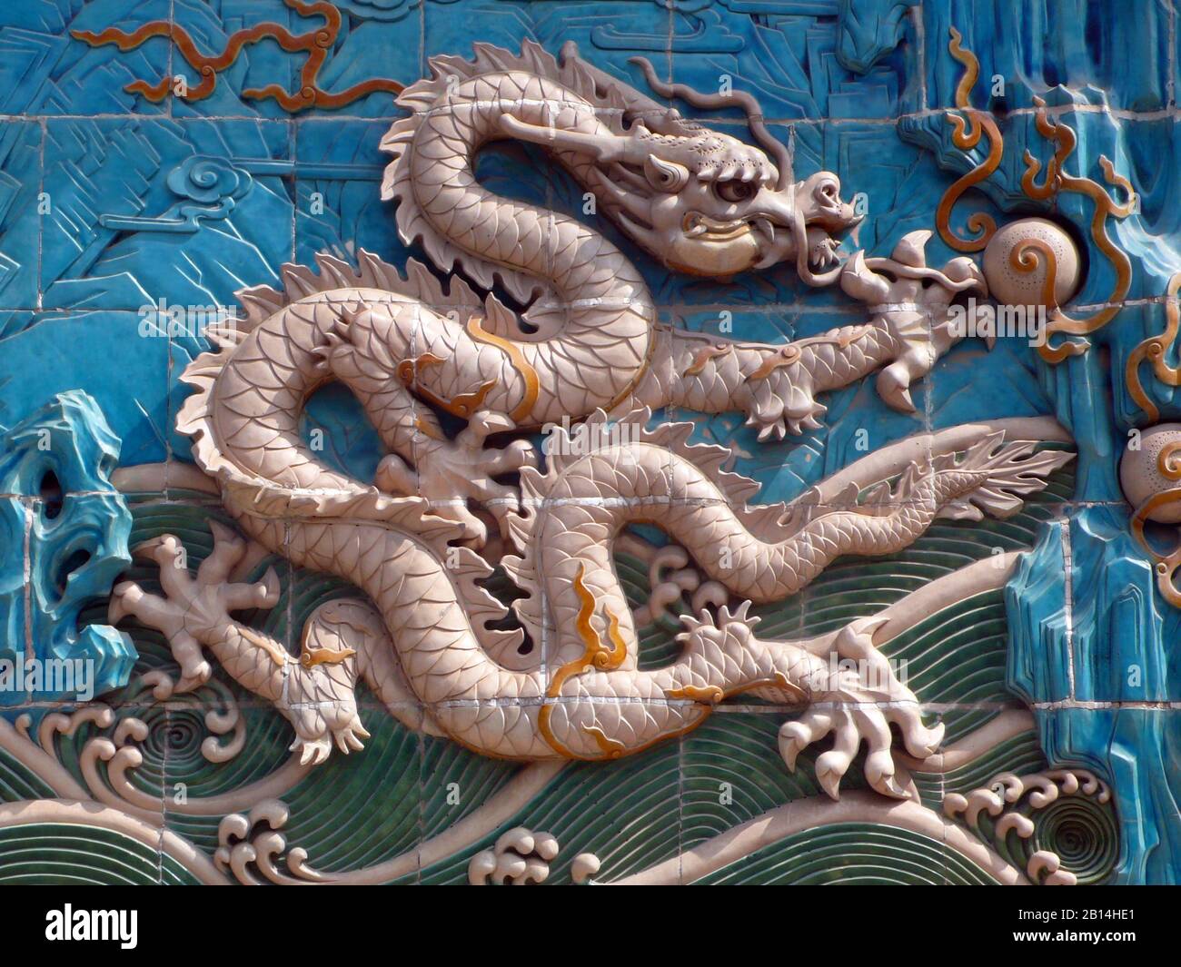 Nine-Dragon Walll，Beihai Park, Beijing, China. Built in Qianlong 21 years (1756),5.96 meters high,1.6 meters thick and 25.52 meters long. Stock Photo