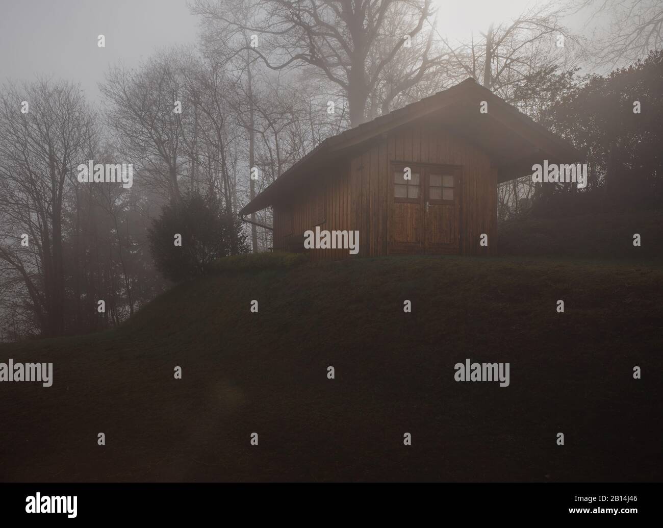 Landscape of the Black Forest with typical old house on a foggy day, Germany, Europe Stock Photo