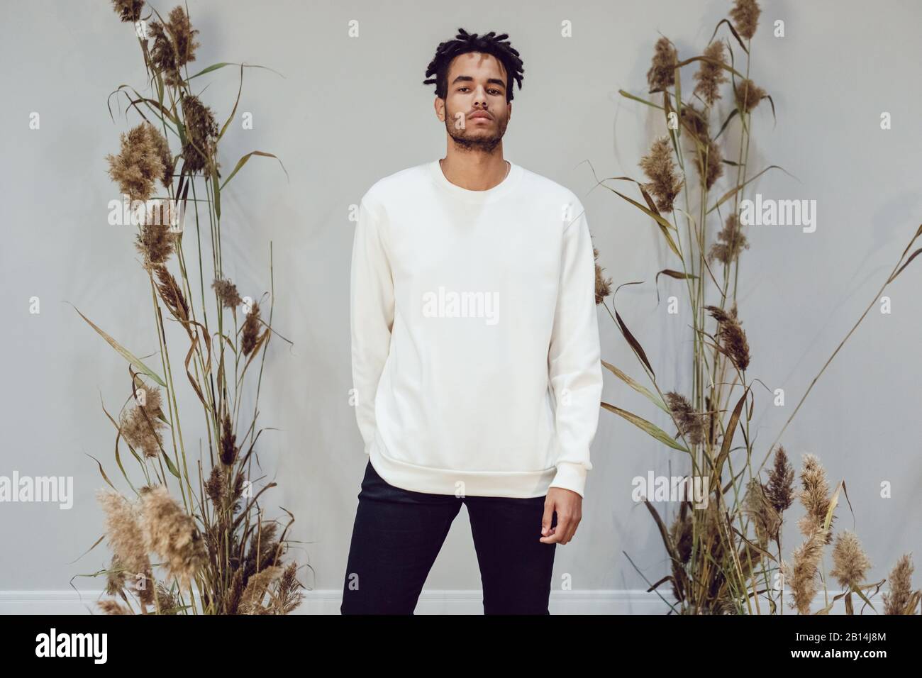African american man wearing white blank sweatshirt. Mock-up. Stock Photo