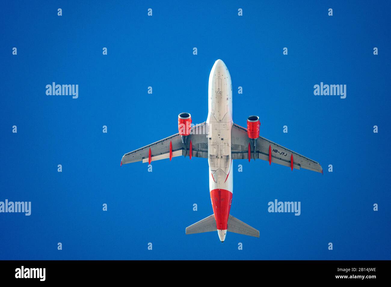 Virgin airlines aeroplane from below flying into Alicante airport Stock Photo