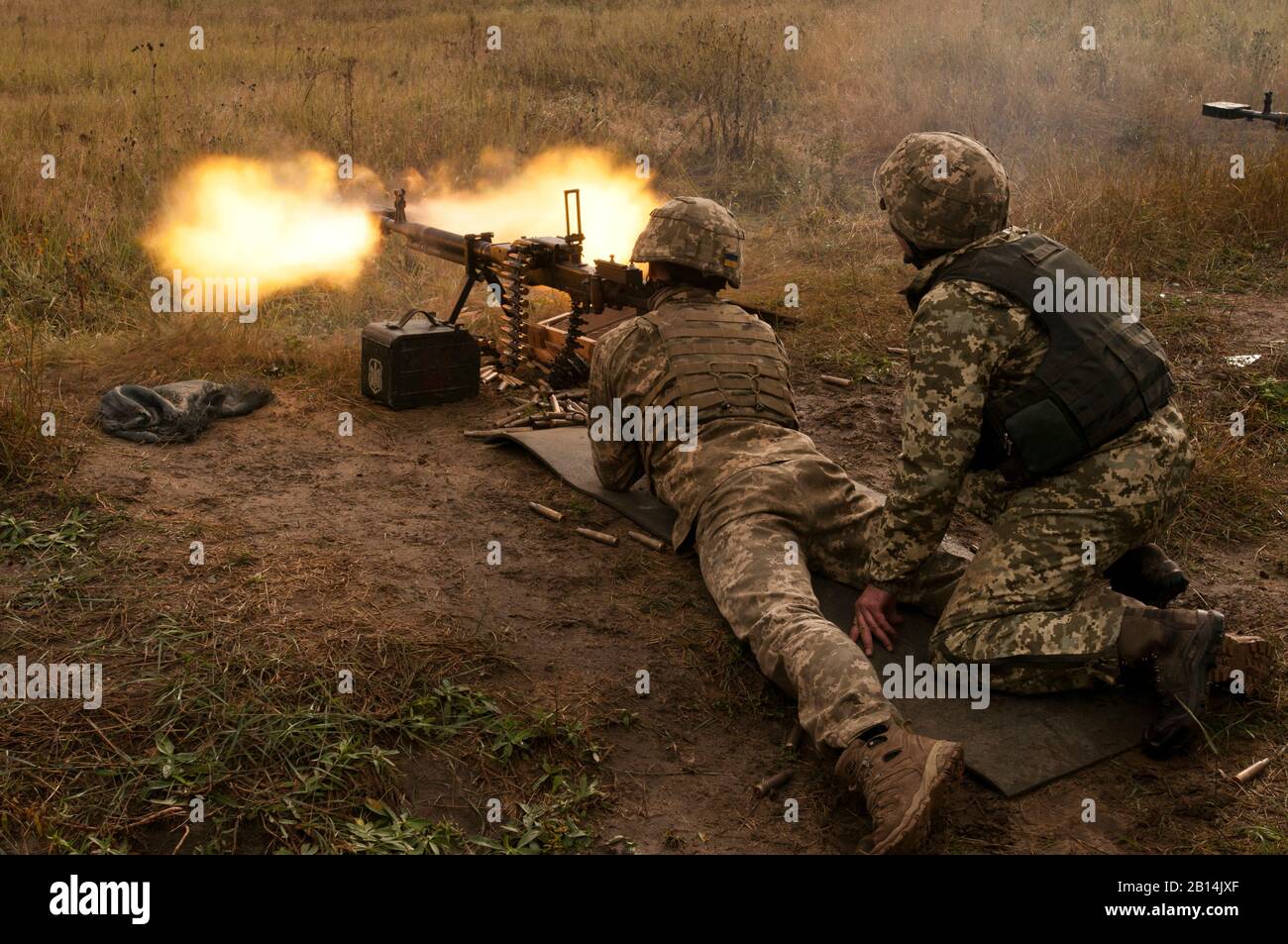 Ukrainian soldiers with the 1st Battalion, 95th Separate Airmobile Brigade train with a DShK 12.7 mm machine gun during a training cycle at the Yavoriv Combat Training Center on the International Peacekeeping and Security Center near Yavoriv, Ukraine, Sept. 6, 2017. Yavoriv CTC Observer Coach Trainers, along with mentors from the Polish army and the U.S. Army's 45th Infantry Brigade Combat Team, led the training for soldiers from the 1st Battalion, 95th Separate Airmobile Brigade during the battalion's rotation through the Yavoriv CTC. The 45th is deployed to Ukraine as part of the Joint Multi Stock Photo