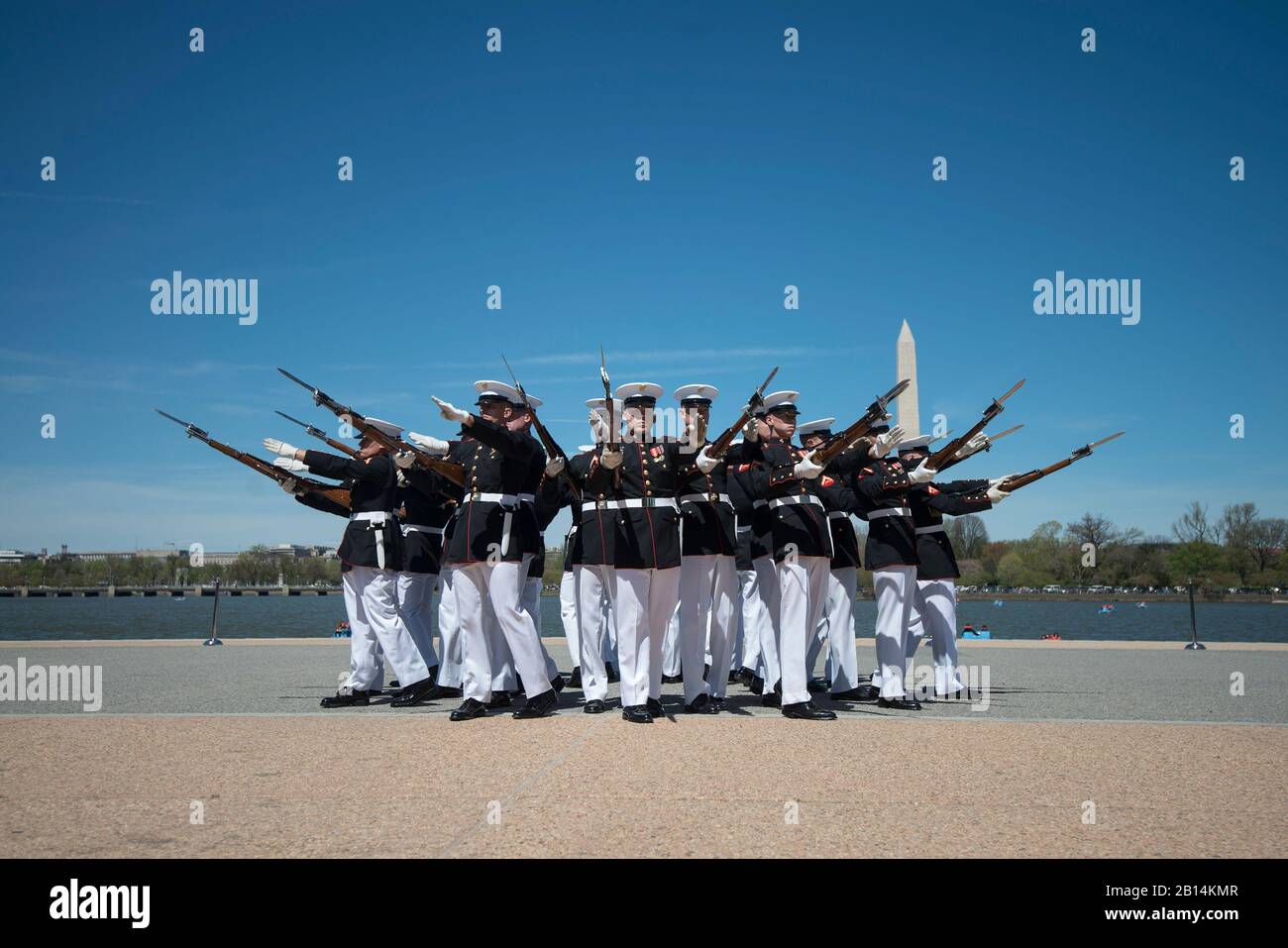 The U.S. Marine Corps Silent Drill Platoon competes during the Joint Service Drill Team Exhibition at the Jefferson Memorial in Washington, D.C, April 8, 2017. Drill teams from all four branches of the U.S. armed forces and the U.S. Coast Guard competed in a display of skills at the event that celebrated U.S. military heritage at the National Cherry Blossom Festival. (U.S. Air National Guard Photo by Staff Sgt. Christopher S. Muncy) Stock Photo