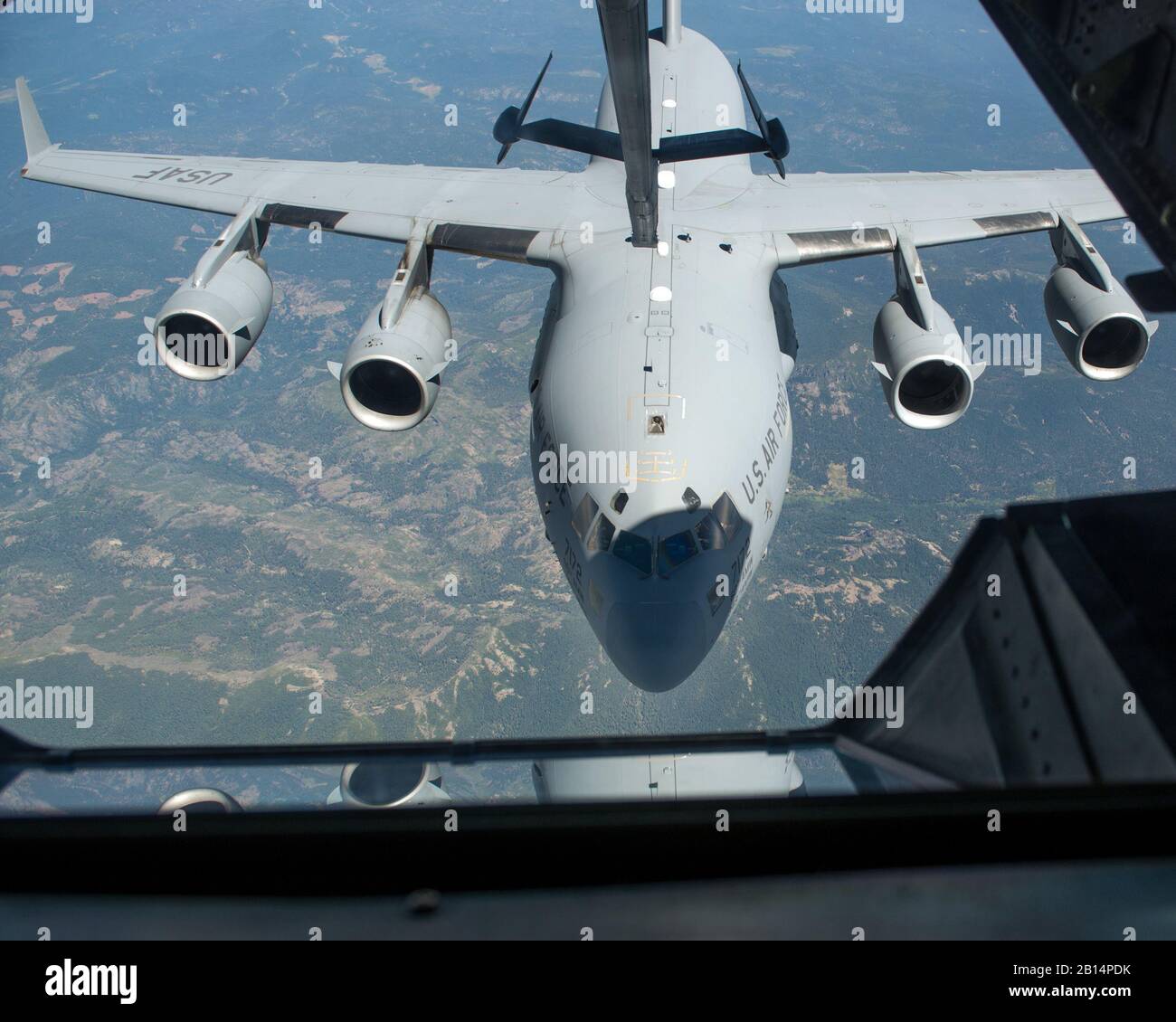 A U.S. Air Force C-17 Globemaster III from the 301st Airlift Squadron, 349th Air Mobility Wing, Travis Air Force Base, Calif., is refueled by a KC-10 Extender, July 20, 2017. The C-17 Globemaster III was conducting a local training mission in Northern Calif. (U.S. Air Force photo Louis Briscese) Stock Photo