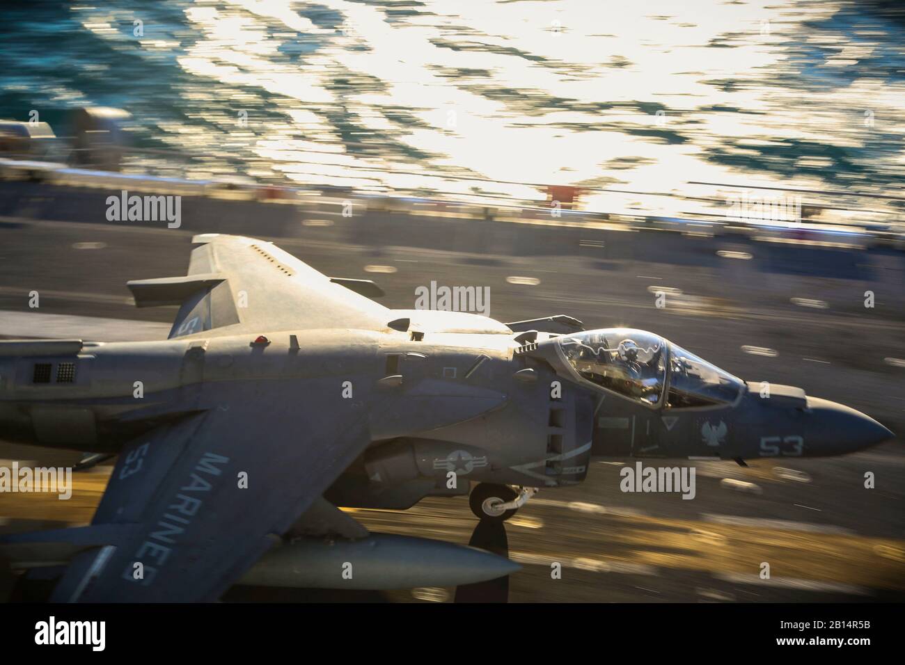 A U.S. Marine Corps AV-8B Harrier with Marine Medium Tiltrotor Squadron (VMM) 162 (REIN), 26th Marine Expeditionary Unit (MEU), takes off from the amphibious assault ship USS Iwo Jima (LHD 7) as part of Combined Composite Training Unit Exercise (COMPTUEX) in the Atlantic Ocean, Nov. 19, 2017. The exercise allows all elements of the Marine Air Ground Task Force (MAGTF) to join and train in realistic scenarios so the MEU as a whole can meet its Pre-Deployment Training Program objectives prior to their upcoming deployment at sea. (U.S. Marine Corps photo by Cpl. Jon Sosner) Stock Photo