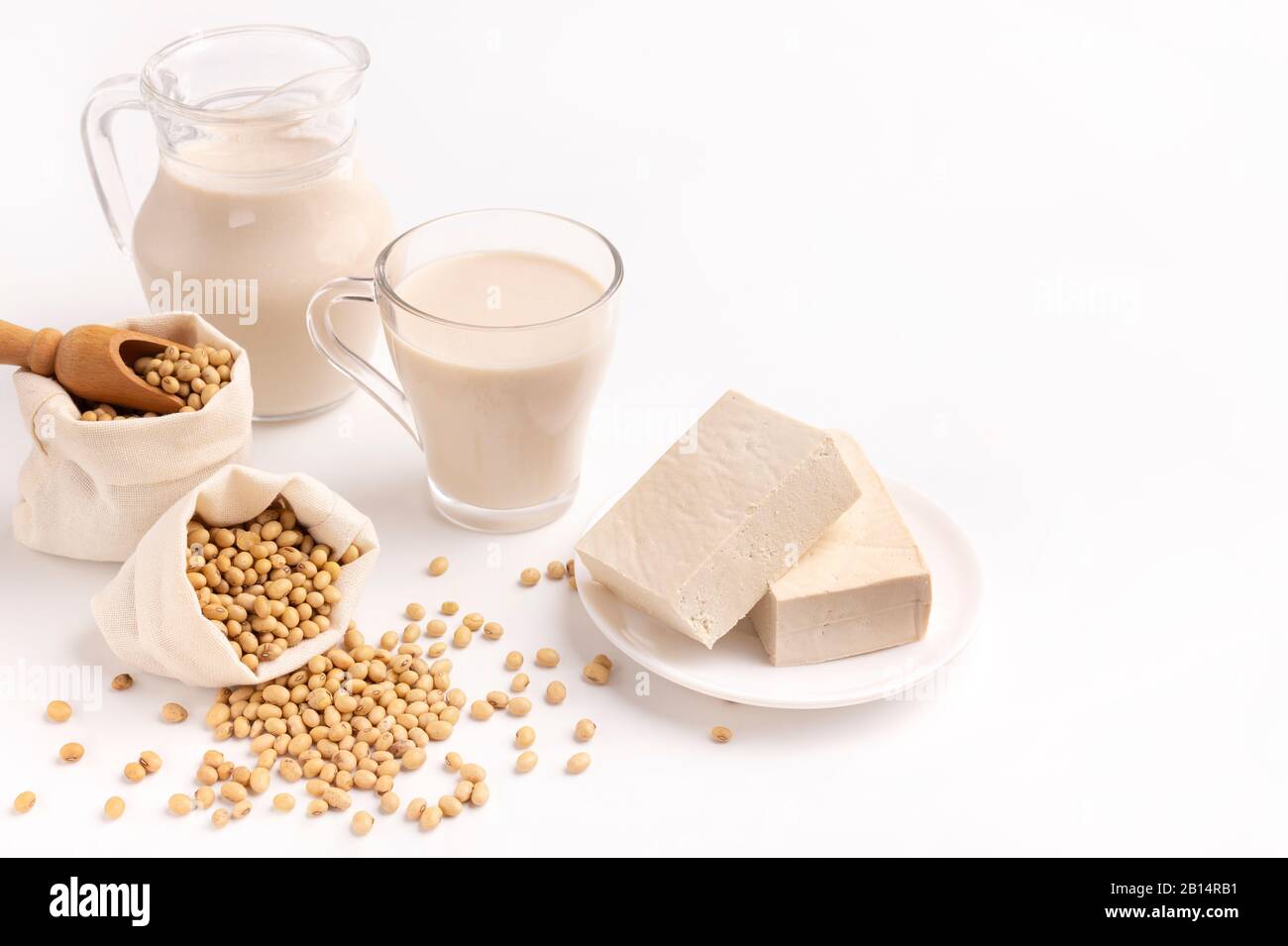 Soy and derivatives. Soy milk, white blocks cheese Stock Photo Alamy