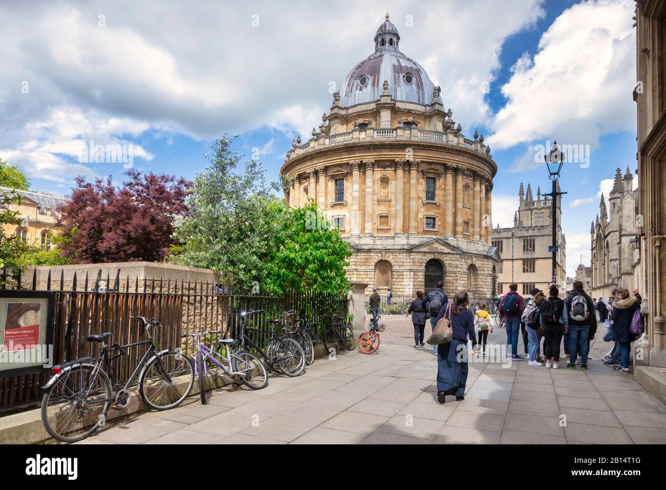 6 June 2019: Oxford, UK - Tourists at the Radcliffe Camera, famous academic library attached to Oxford University, designed by James Gibbs in neo-clas Stock Photo