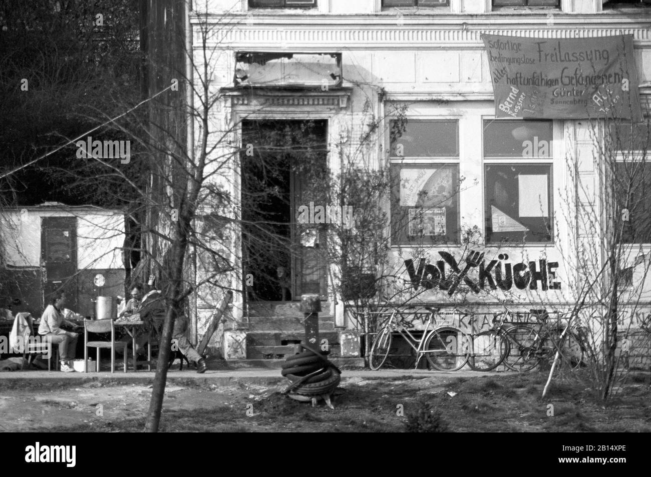 The Volksküche, or People's Kitchen, hippie hangout and cooperative on St. Pauli Hafenstraße, Hamburg, Germany, circa 1988.  Black and white film photograph Stock Photo