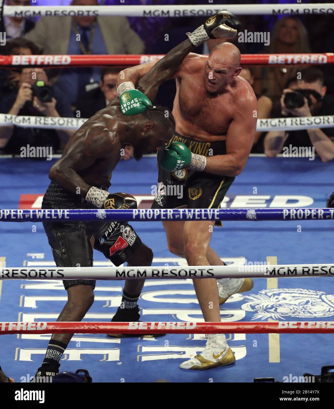 Tyson Fury (right) and Deontay Wilder during the World Boxing Council World Heavy Title bout at the MGM Grand, Las Vegas. Stock Photo