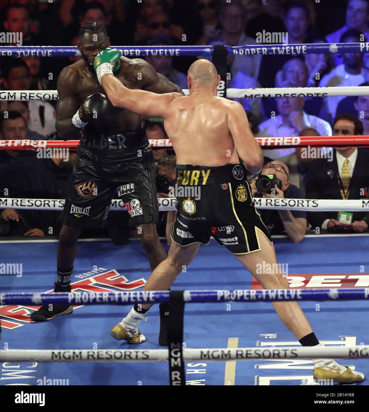 Tyson Fury (right) and Deontay Wilder during the World Boxing Council World Heavy Title bout at the MGM Grand, Las Vegas. Stock Photo