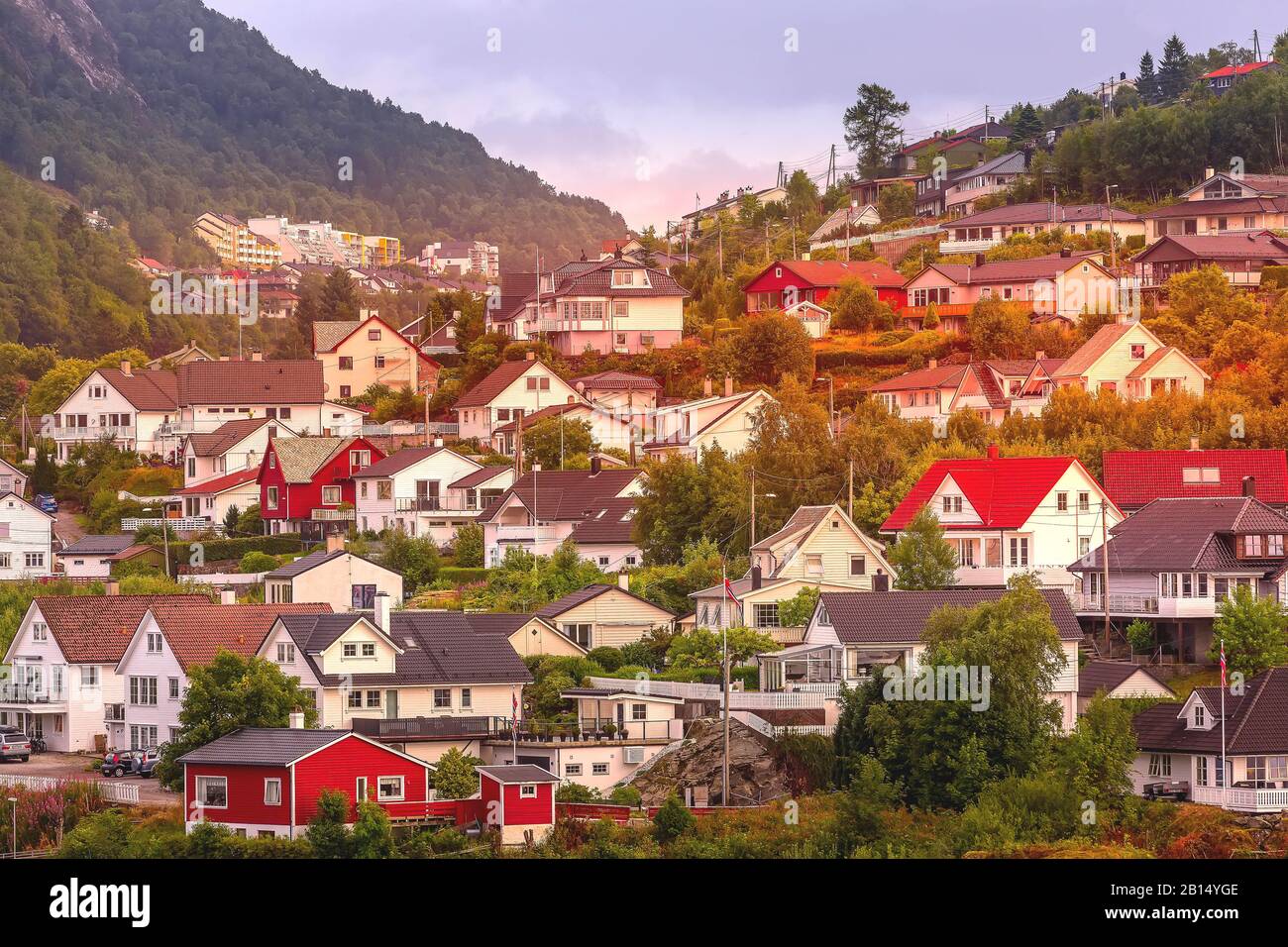 Norwegian scandinavian sunset landscape with fjord water, mountains and ...