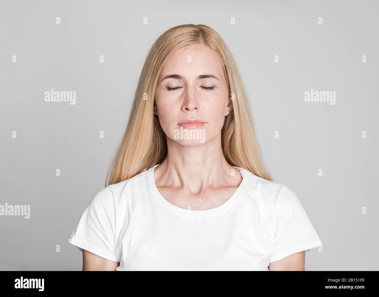 Beautiful blonde woman aged 40s hi-res stock photography and images - Alamy