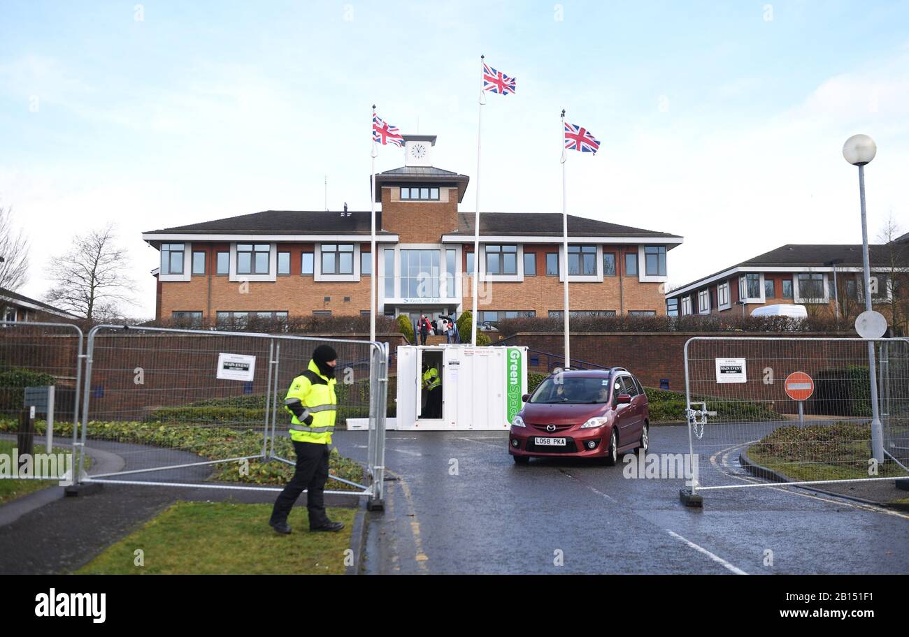 A car leaves Kents Hill Park Training and Conference Centre in Milton Keynes where Coronavirus evacuees were released from quarantine today and allowed to go home. Stock Photo