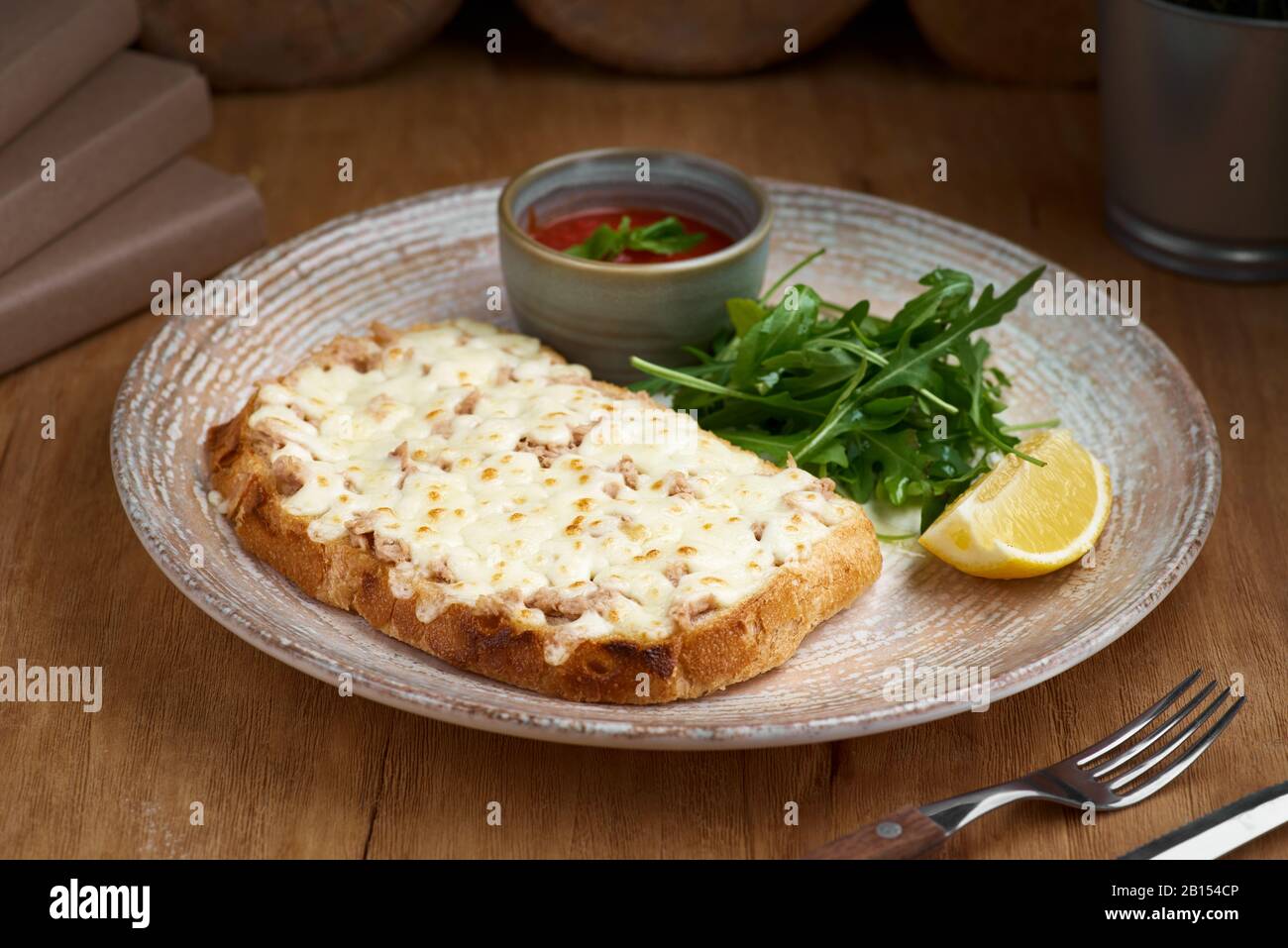 Closeup of a tuna melt topped with cheddar cheese Stock Photo Alamy