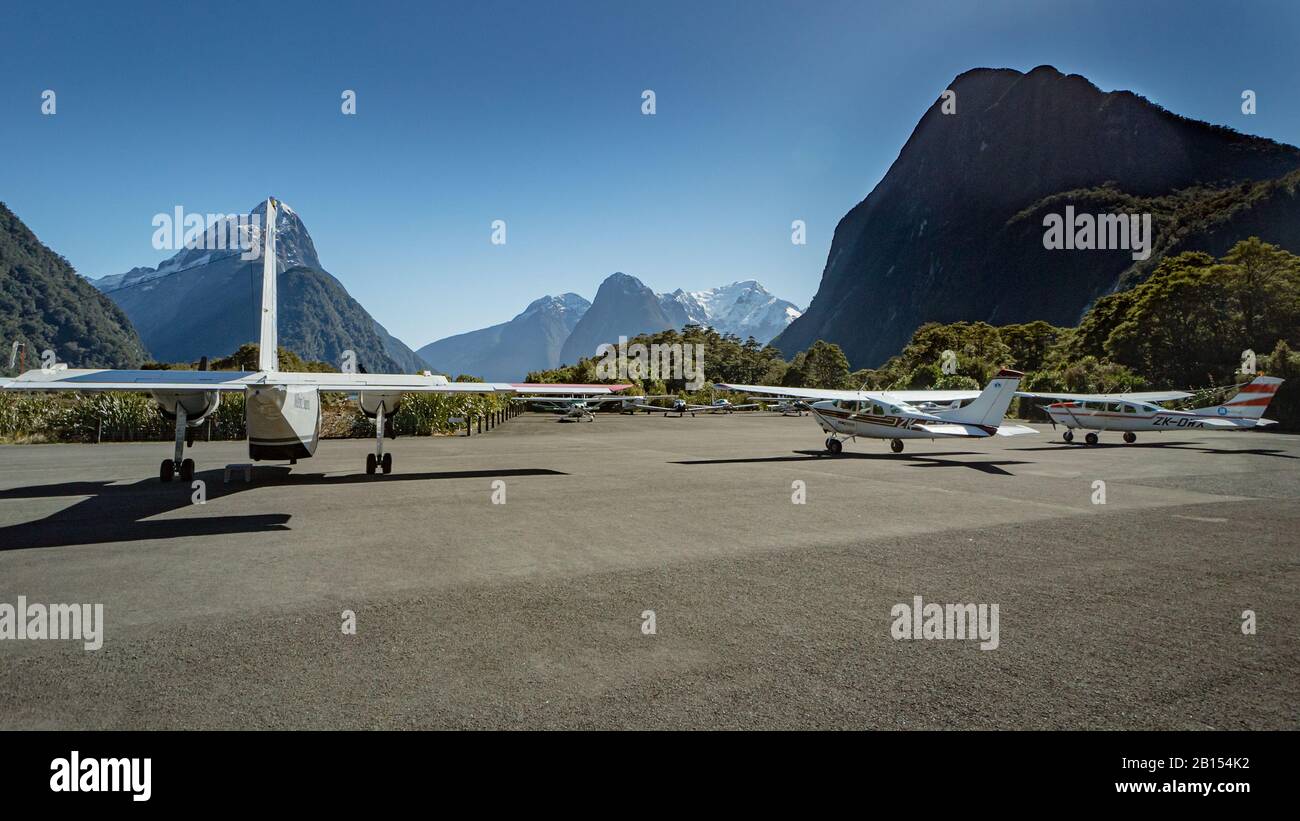 A visit from a flying club boosts the numbers at the Miford Sound Airport, New Zealand Stock Photo