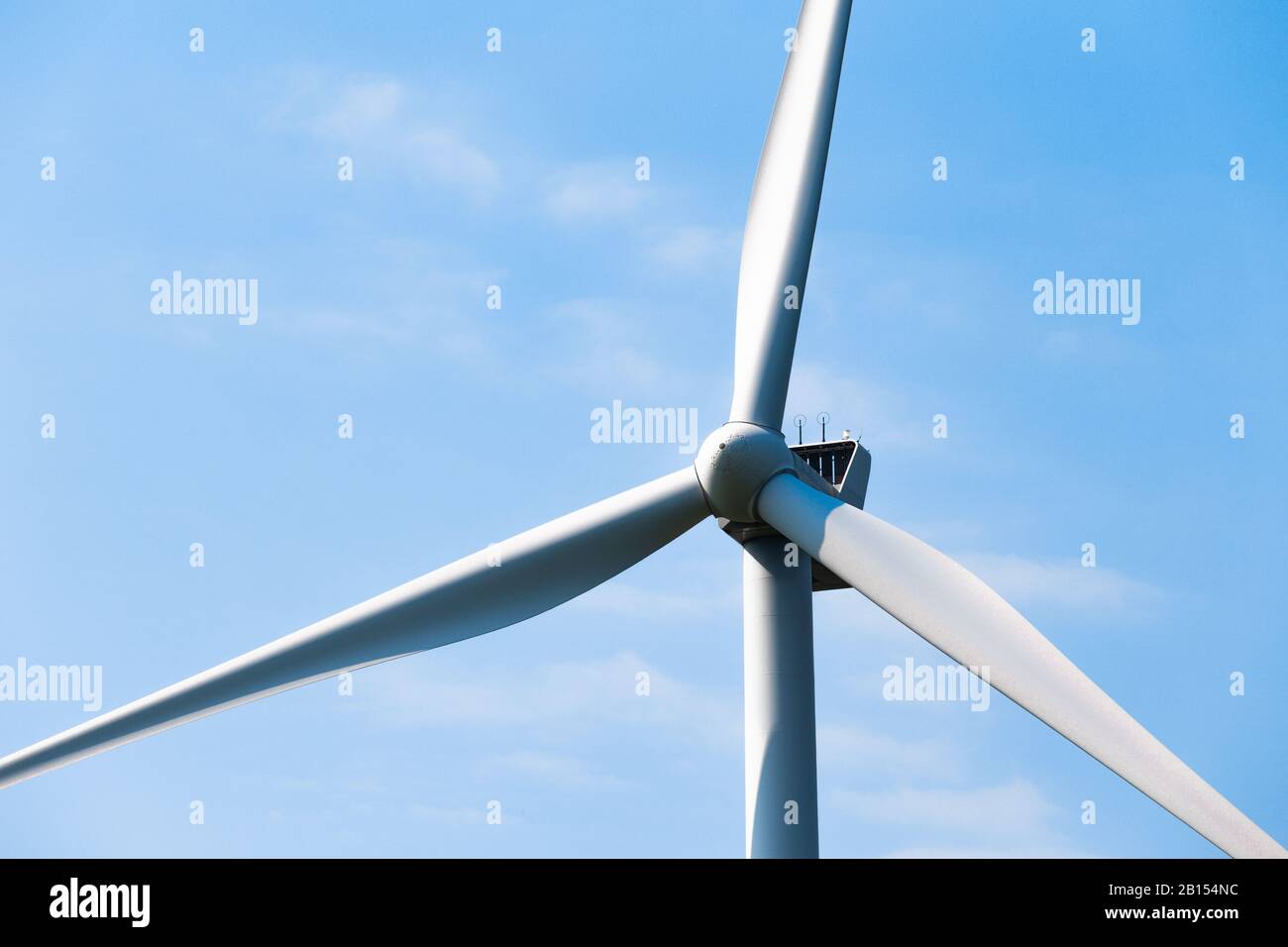 Details wind turbine of blue sky on background Stock Photo - Alamy