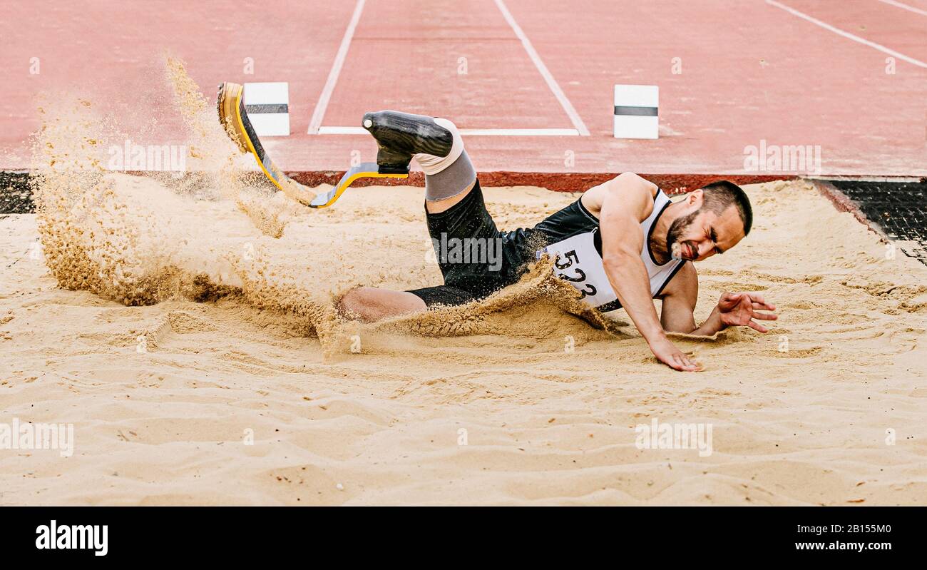 athlete disabled amputee on prosthetic long jump in para athletics Stock Photo