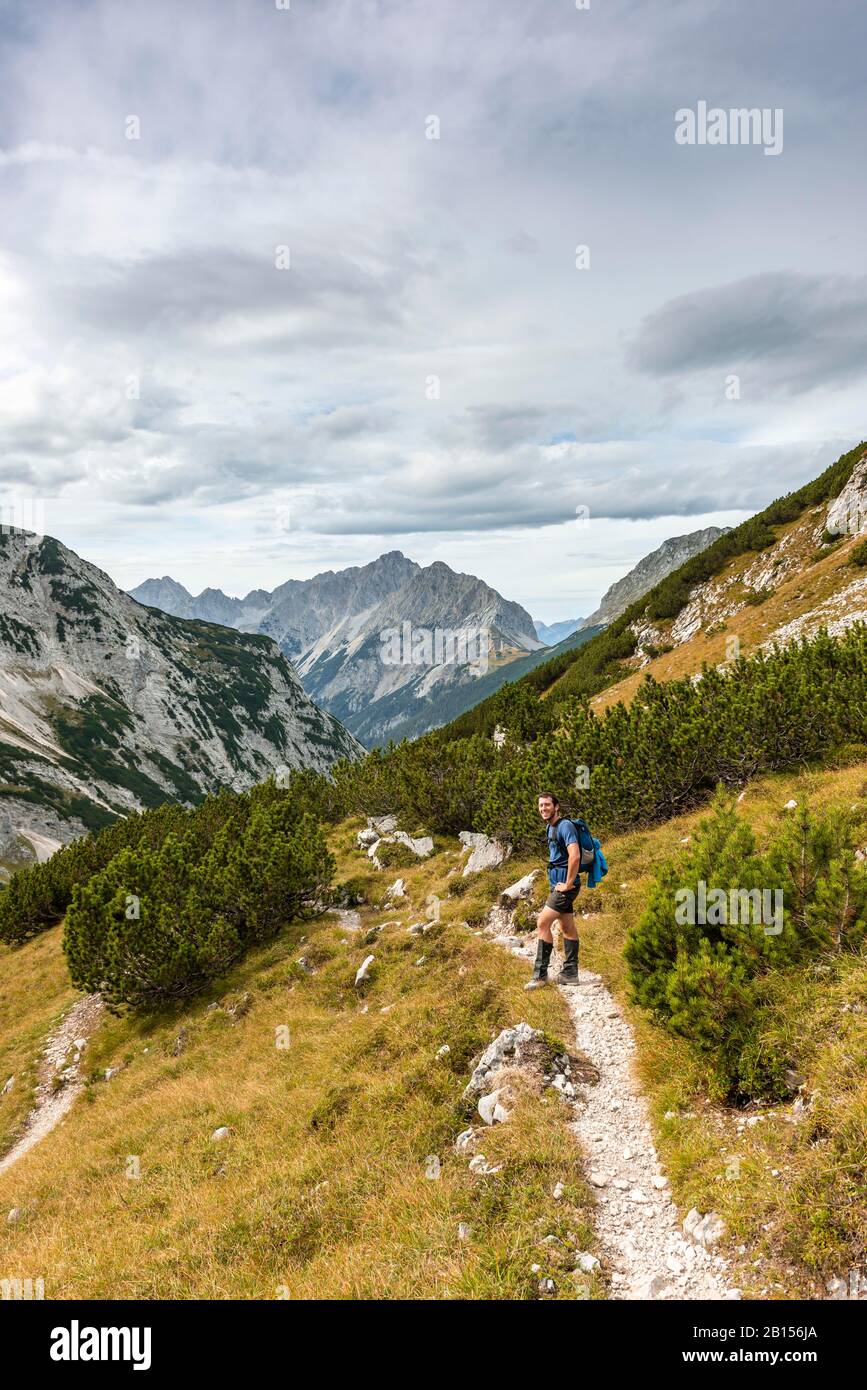 Hikers on hiking trail to the Birkkarspitze and Oedkarspitze, Karwendeltal, Tyrol, Austria Stock Photo