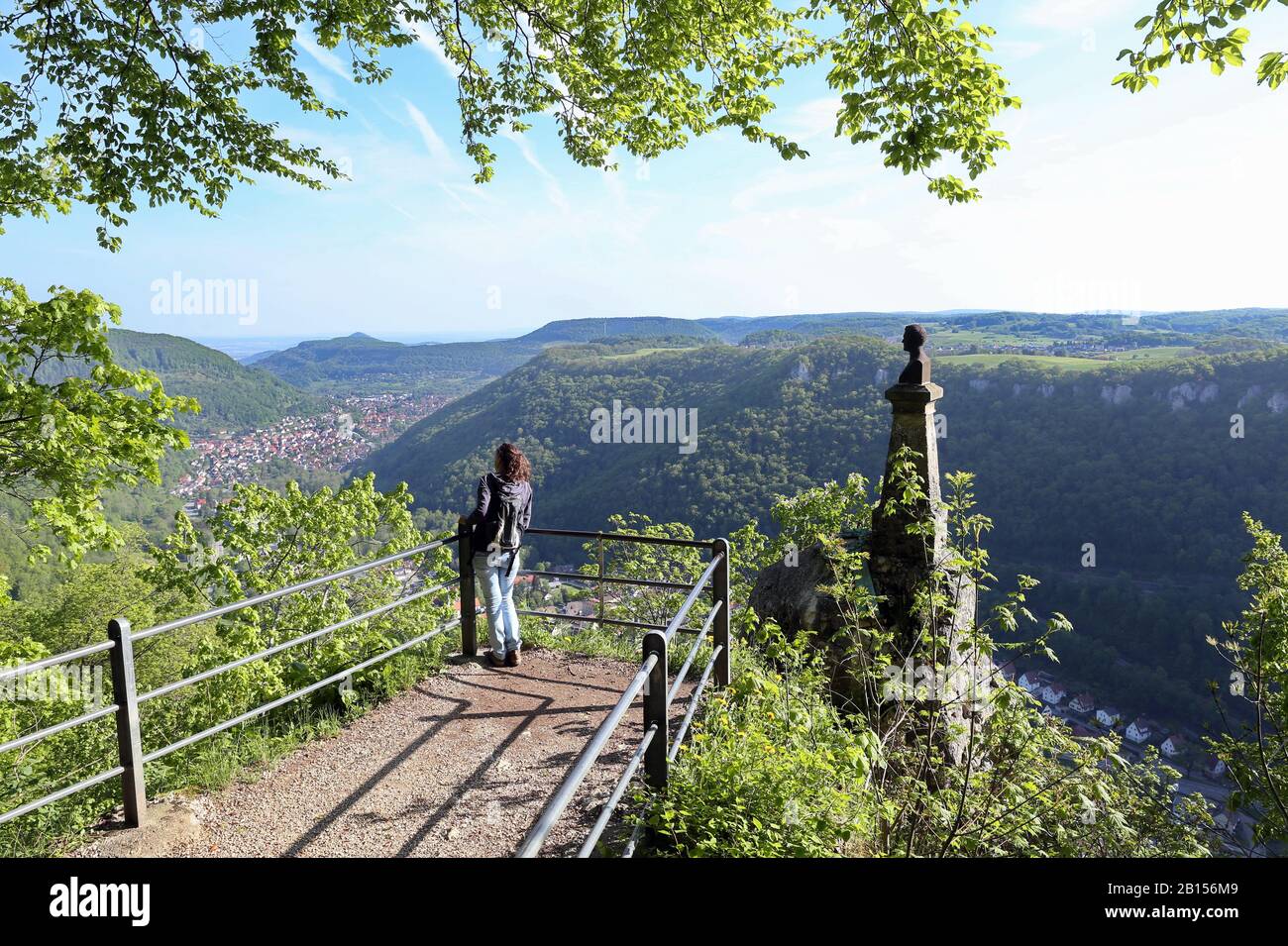 Woman enjoying the view at Wilhelm Hauff monument near Lichtenstein castle Stock Photo
