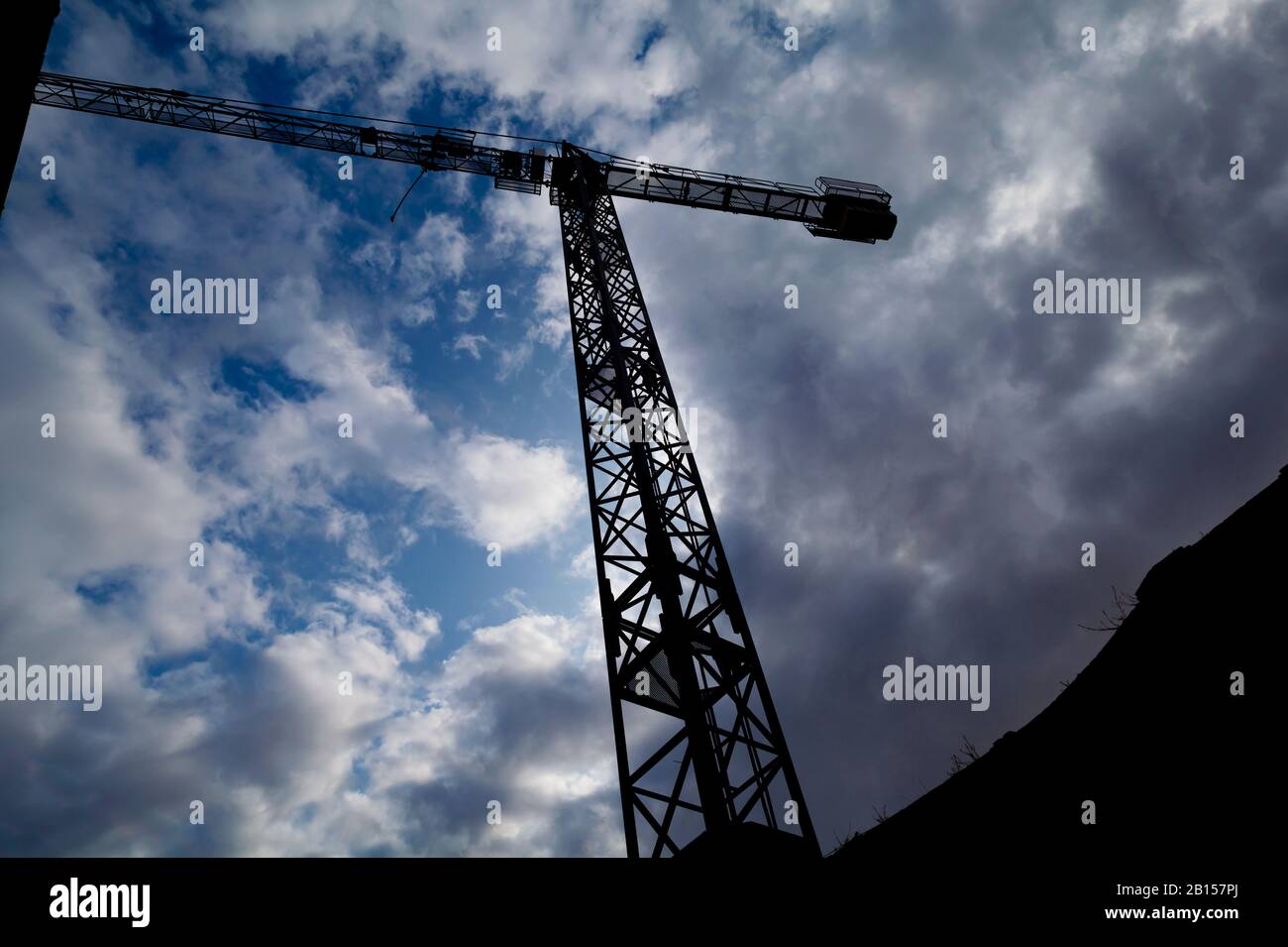 Tower Crane Silhouette (with blue cloudy sky Stock Photo - Alamy