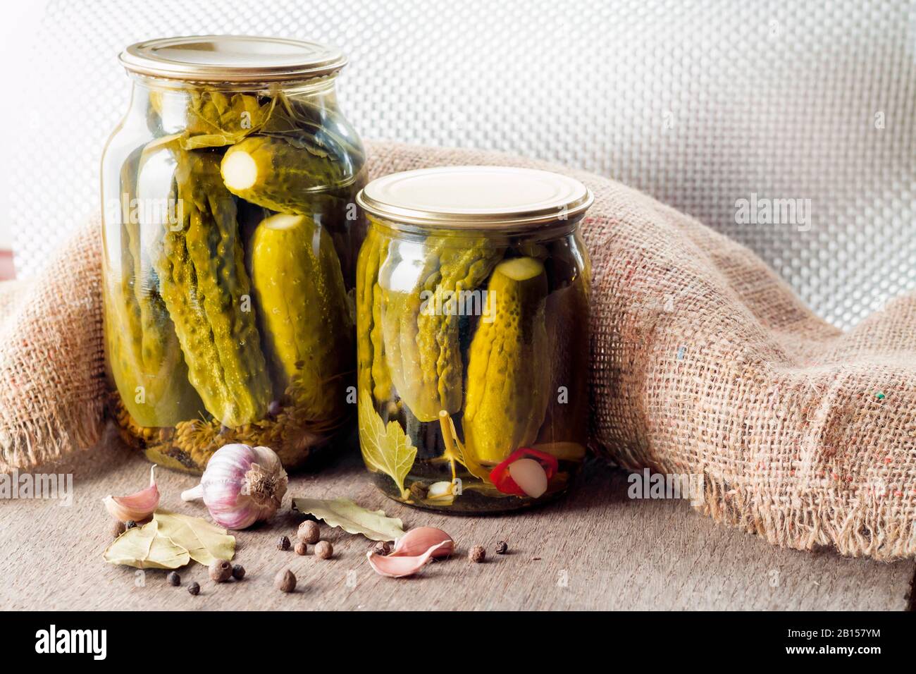 Glass jars with homemade pickles, sealed with metal lid Stock Photo Alamy