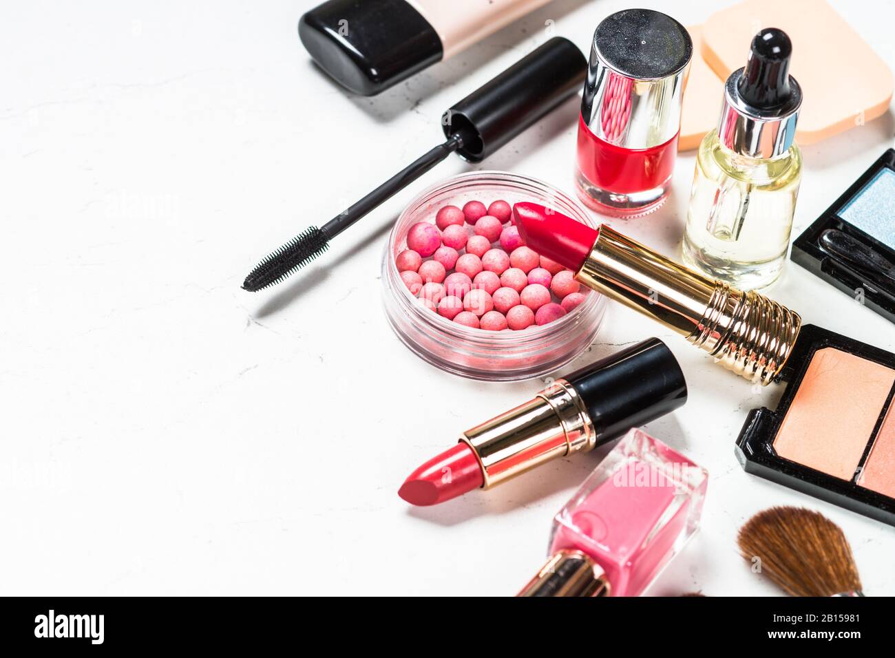 Makeup professional cosmetics on white background Stock Photo - Alamy, image size:1300x956