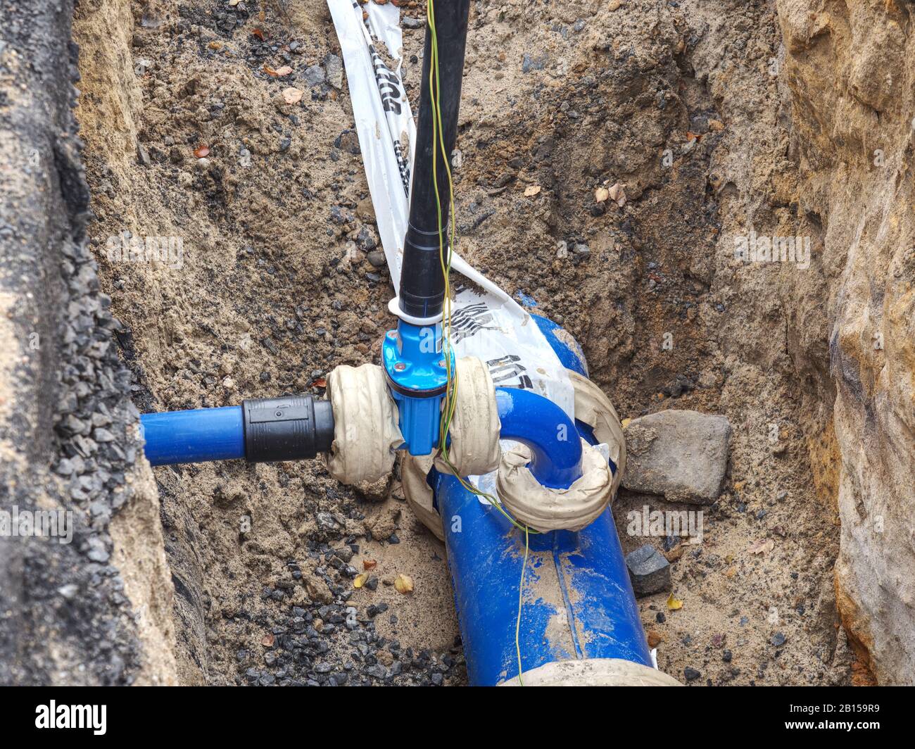 Repair of the underground broken pipe with replace new for domestic water supply Stock Photo Alamy