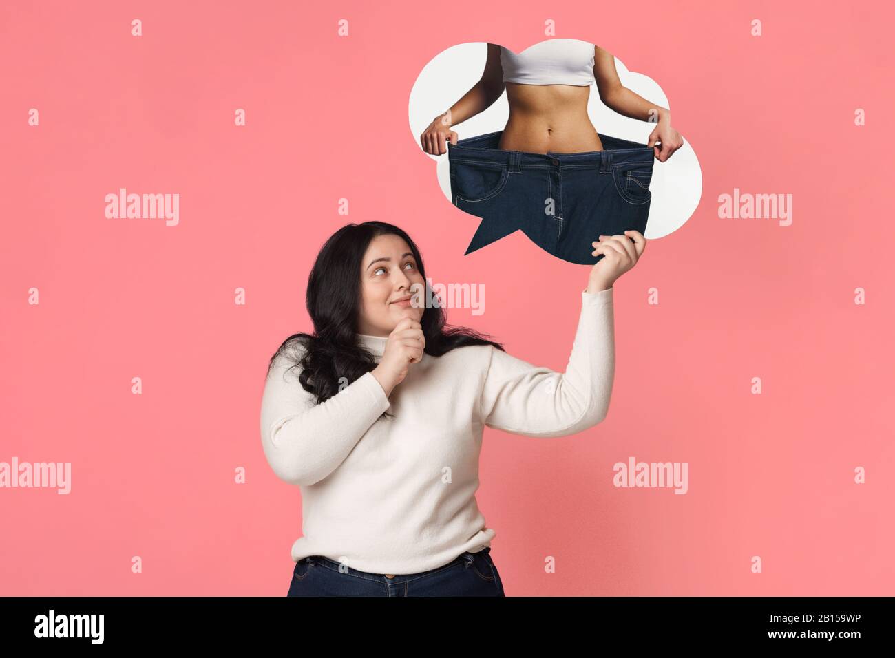 Overweight girl dreaming about slim fit body Stock Photo