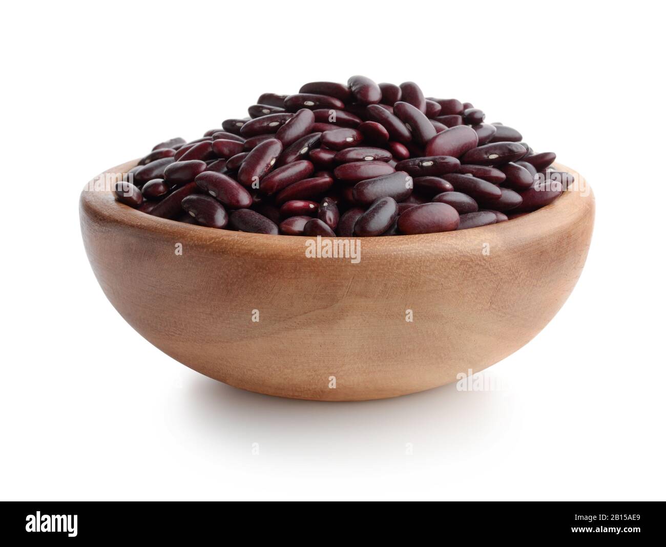 Red beans in a wooden bowl isolated on white background. Front view. Stock Photo