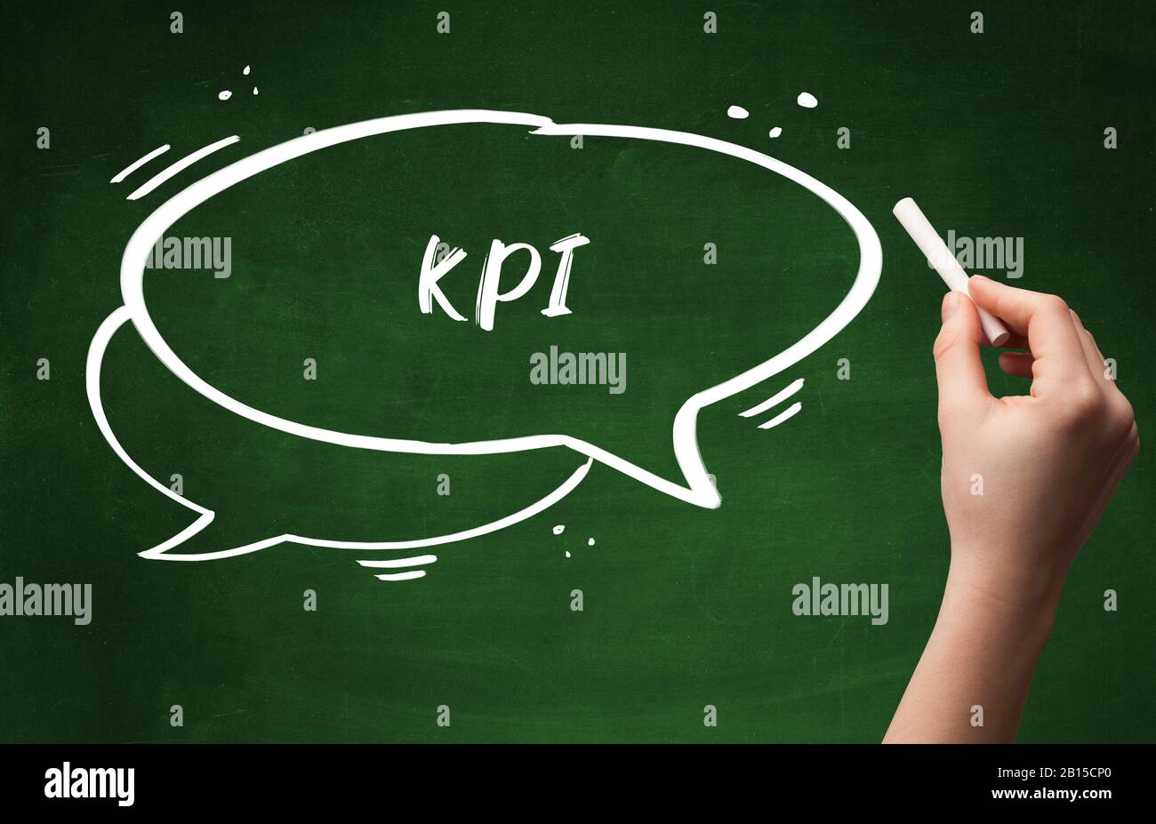 Hand drawing KPI abbreviation with white chalk on blackboard Stock