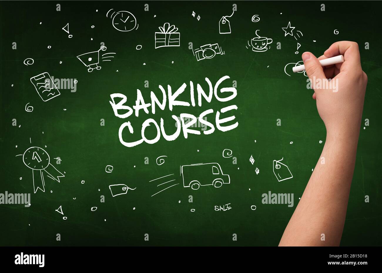 Hand drawing BANKING COURSE inscription with white chalk on blackboard ...