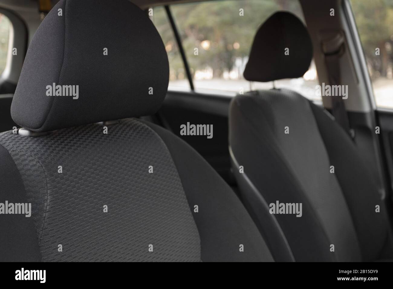 https://c8.alamy.com/comp/2B15DY9/car-interior-part-of-front-seats-close-2B15DY9.jpg