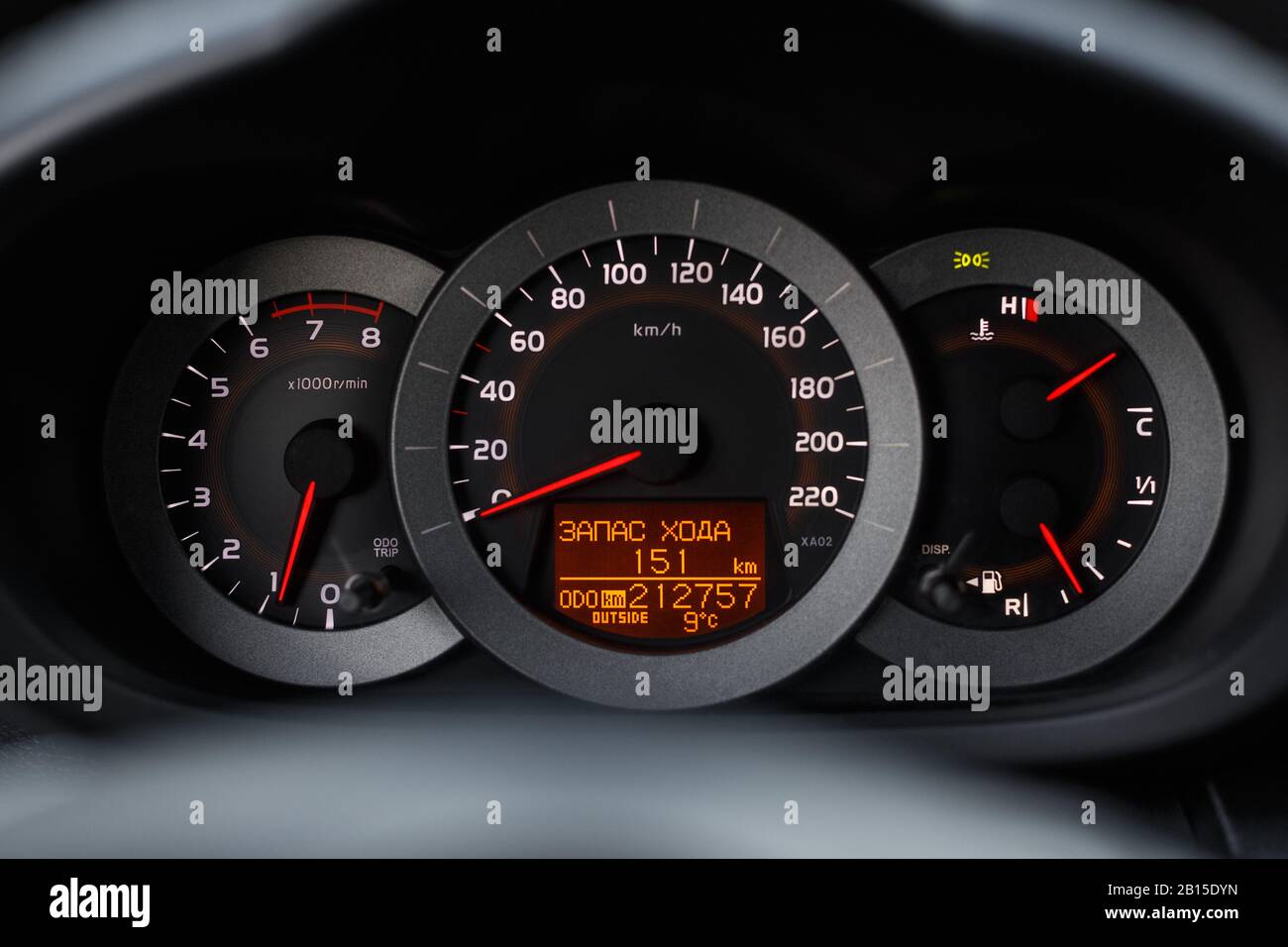 Dashboard closeup, car interior, red light Stock Photo Alamy