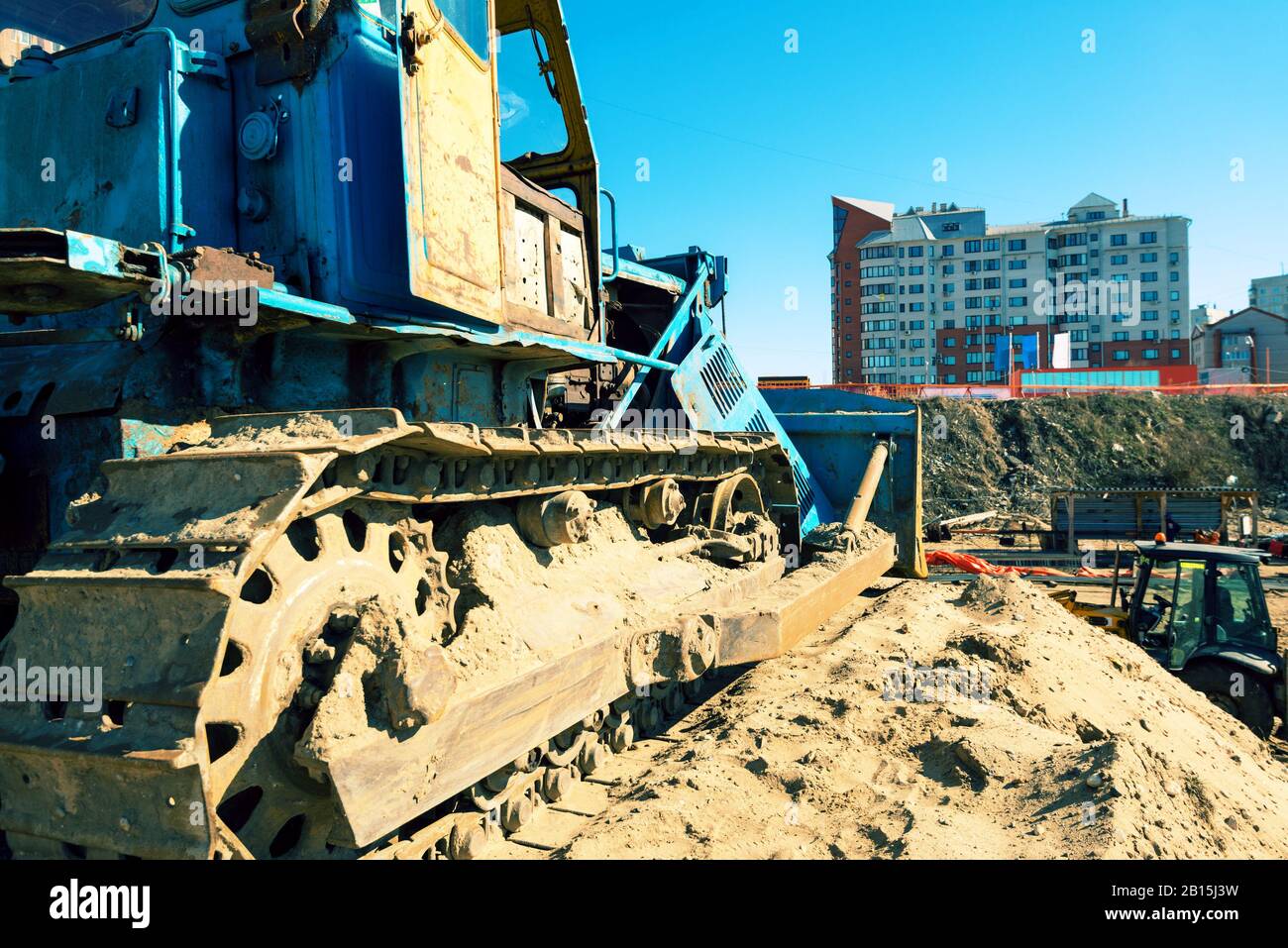 Old bulldozer on a construction site Stock Photo