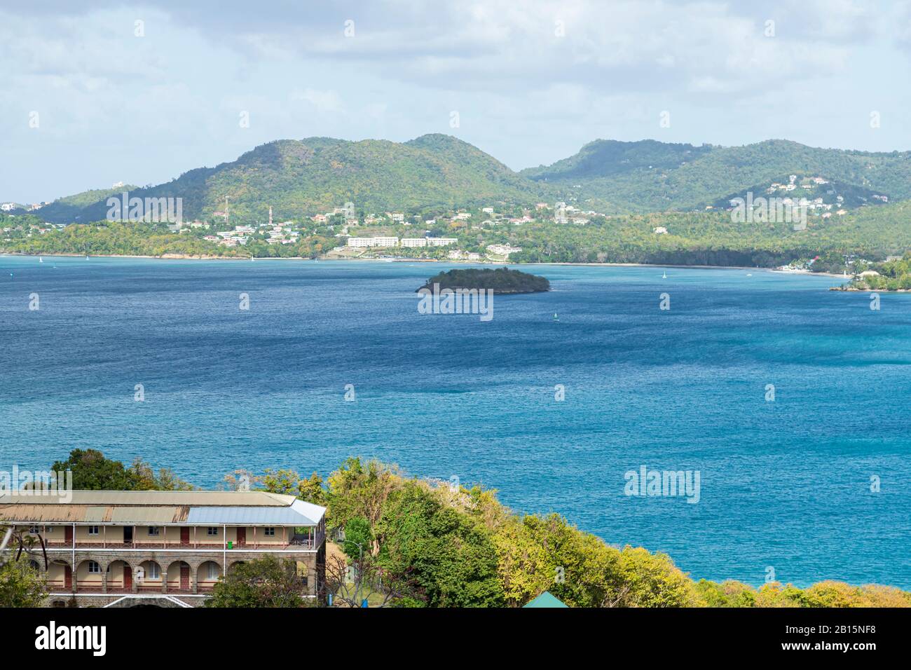 Picturesque landscape and sea scenery of Vigie up to Gros-Islet St. Lucia inclusive of Saint Mary's College bottom left corner and Rat Island Stock Photo