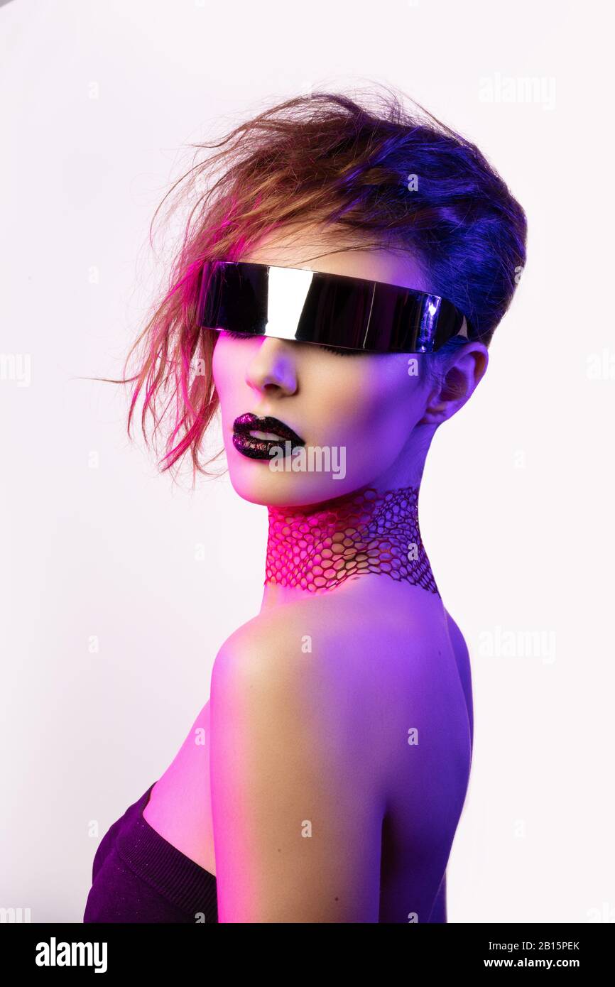 Colorful portrait of a young woman wearing futuristic glasses Stock ...