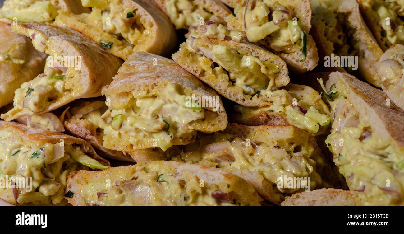 Cypriot pie chicken sauce wood background Stock Photo