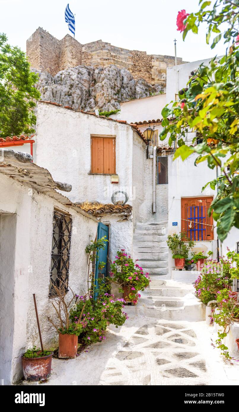 Old narrow street in Anafiotika, Plaka district, Athens, Greece. Plaka is  one of the main tourist attractions of Athens. Scenic alley between white  ho Stock Photo - Alamy