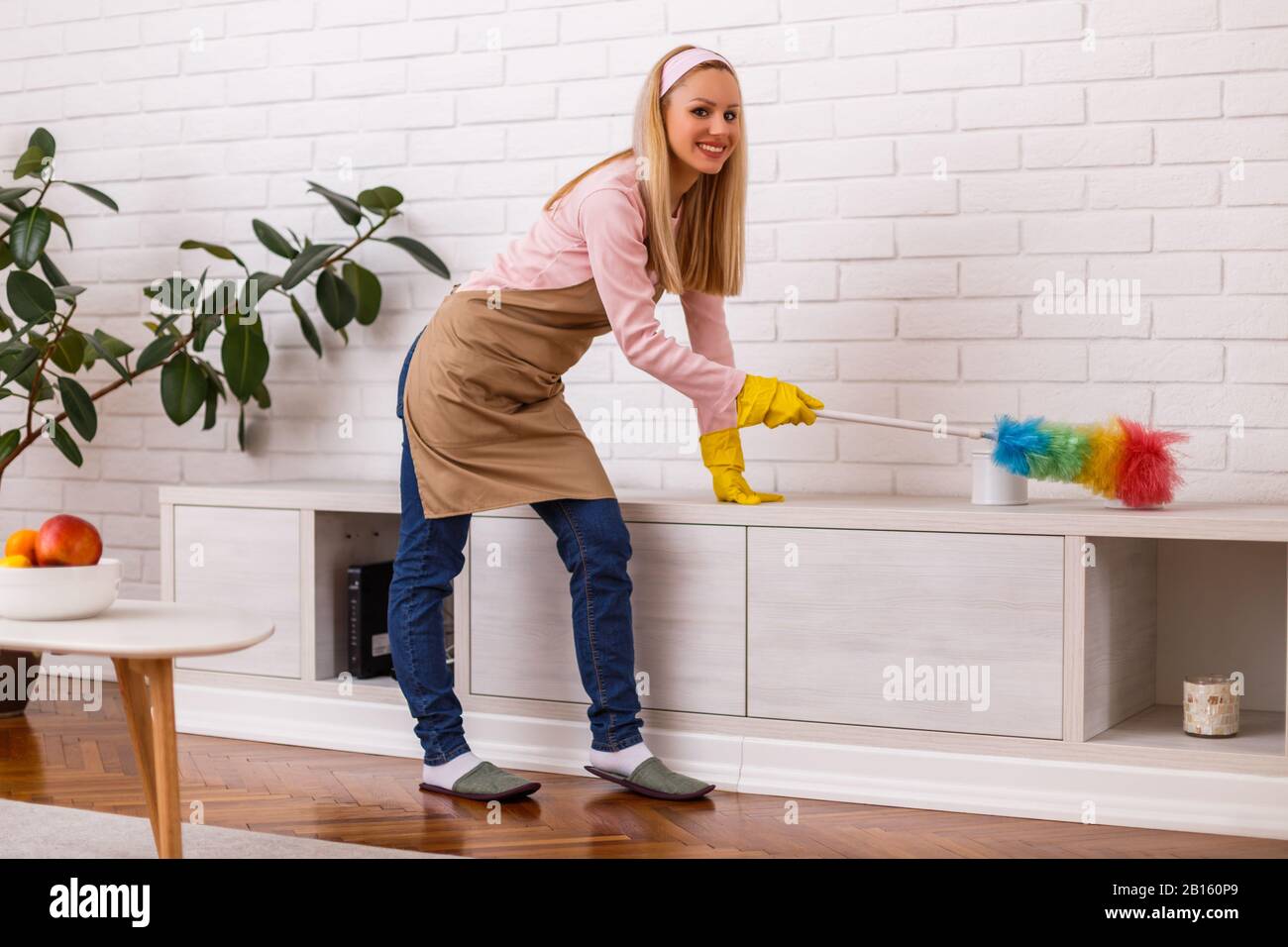 Housewife cleaning duster hi-res stock photography and images - Alamy
