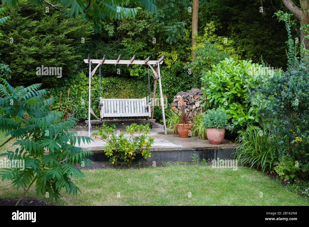Back Garden And Patio With Furniture In A British Home Uk Stock Photo Alamy
