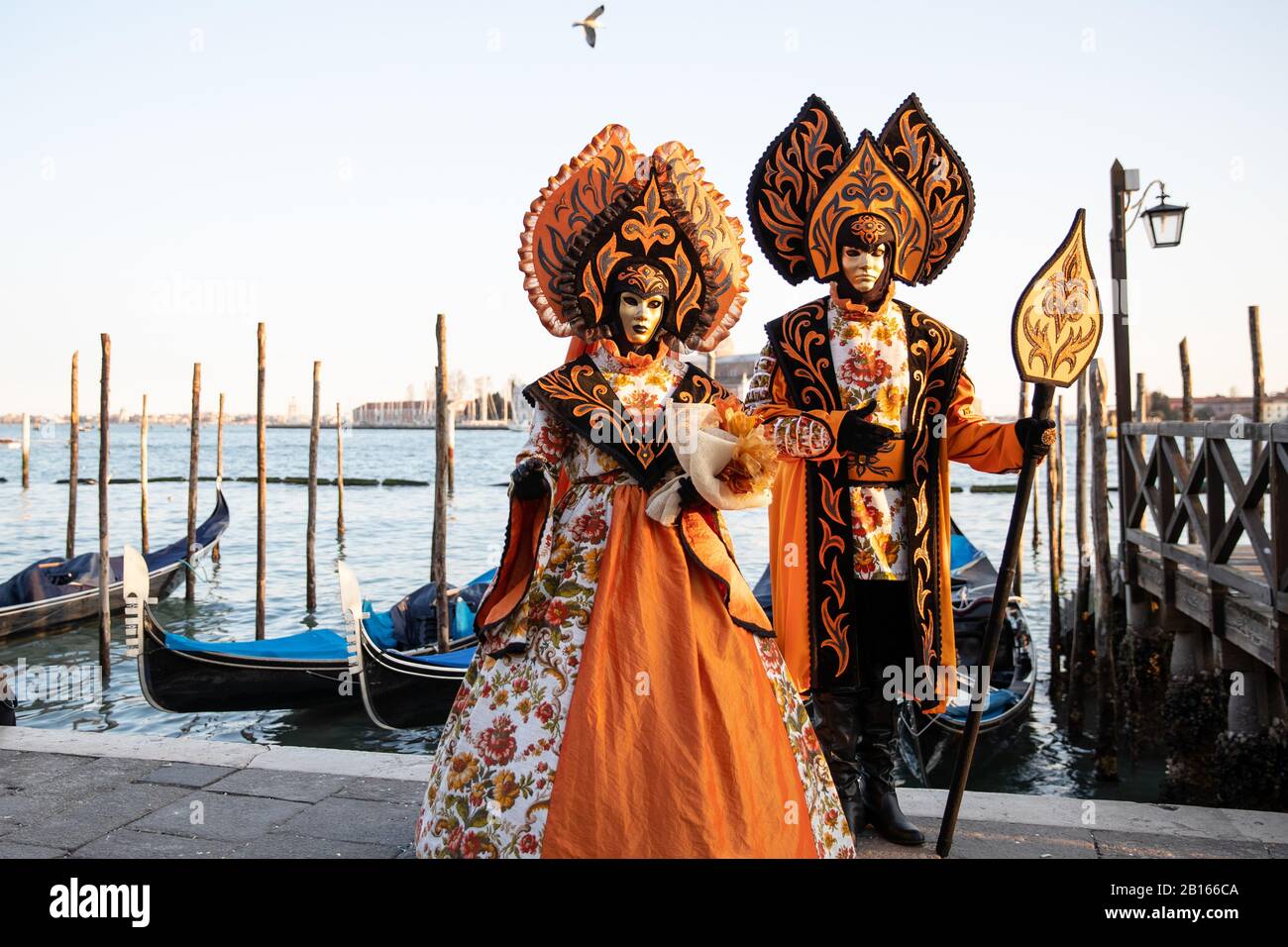 Carnival 2020 celebration in St. Mark's square in Venice where different masks pose for tourists on febrary 22.2020 Stock Photo