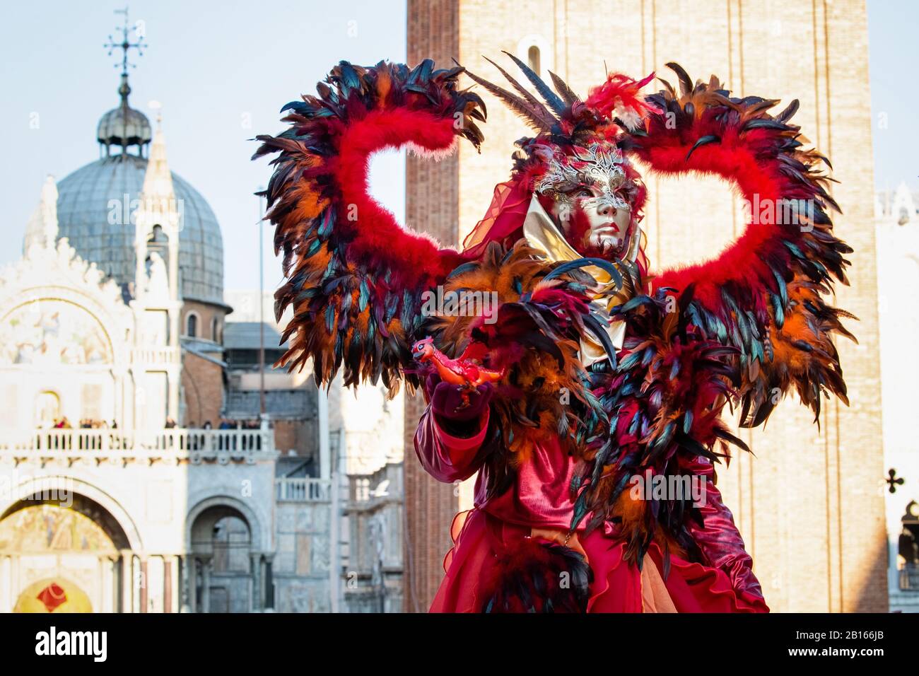 Carnival 2020 celebration in St. Mark's square in Venice where different masks pose for tourists on febrary 22.2020 Stock Photo