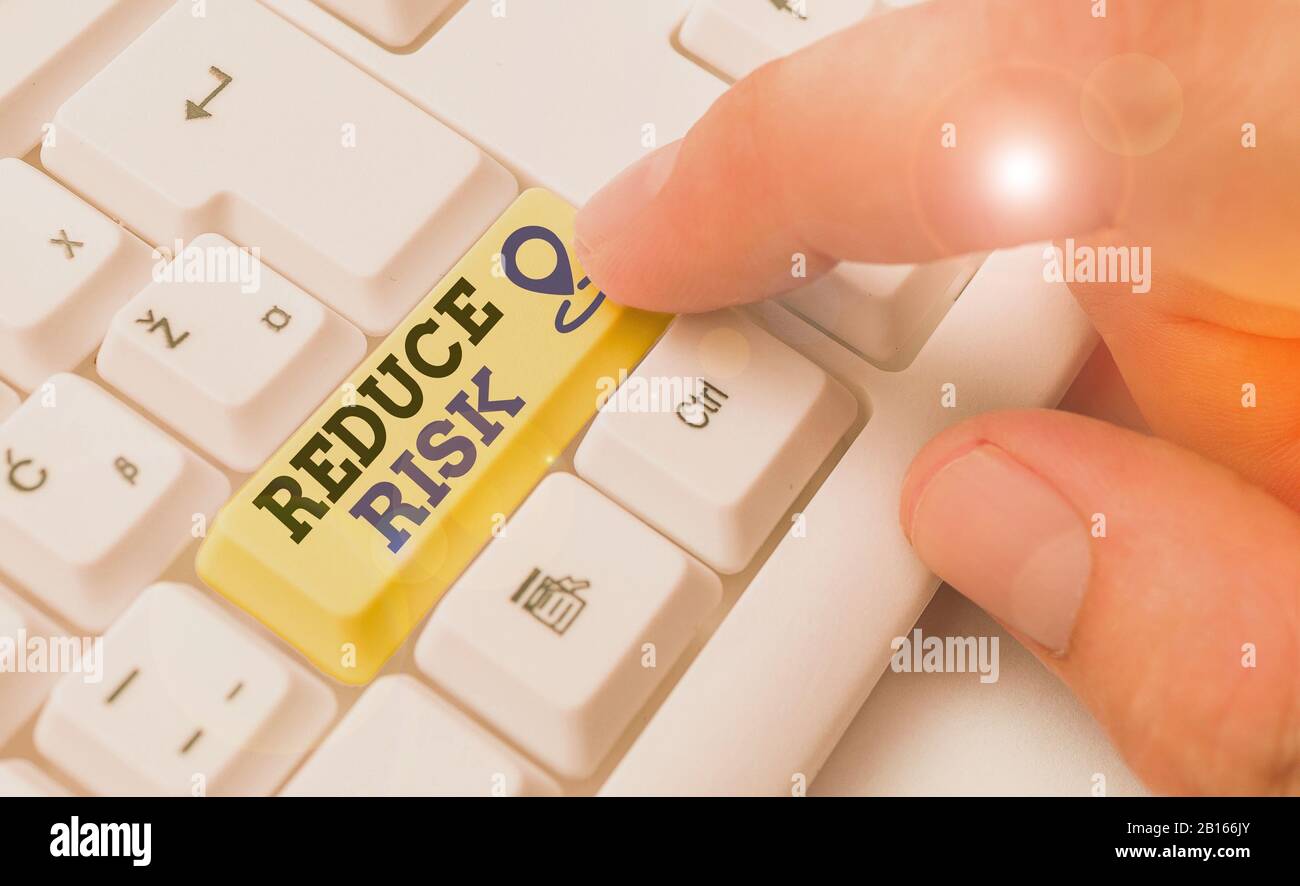 Conceptual hand writing showing Reduce Risk. Concept meaning lessen the ...